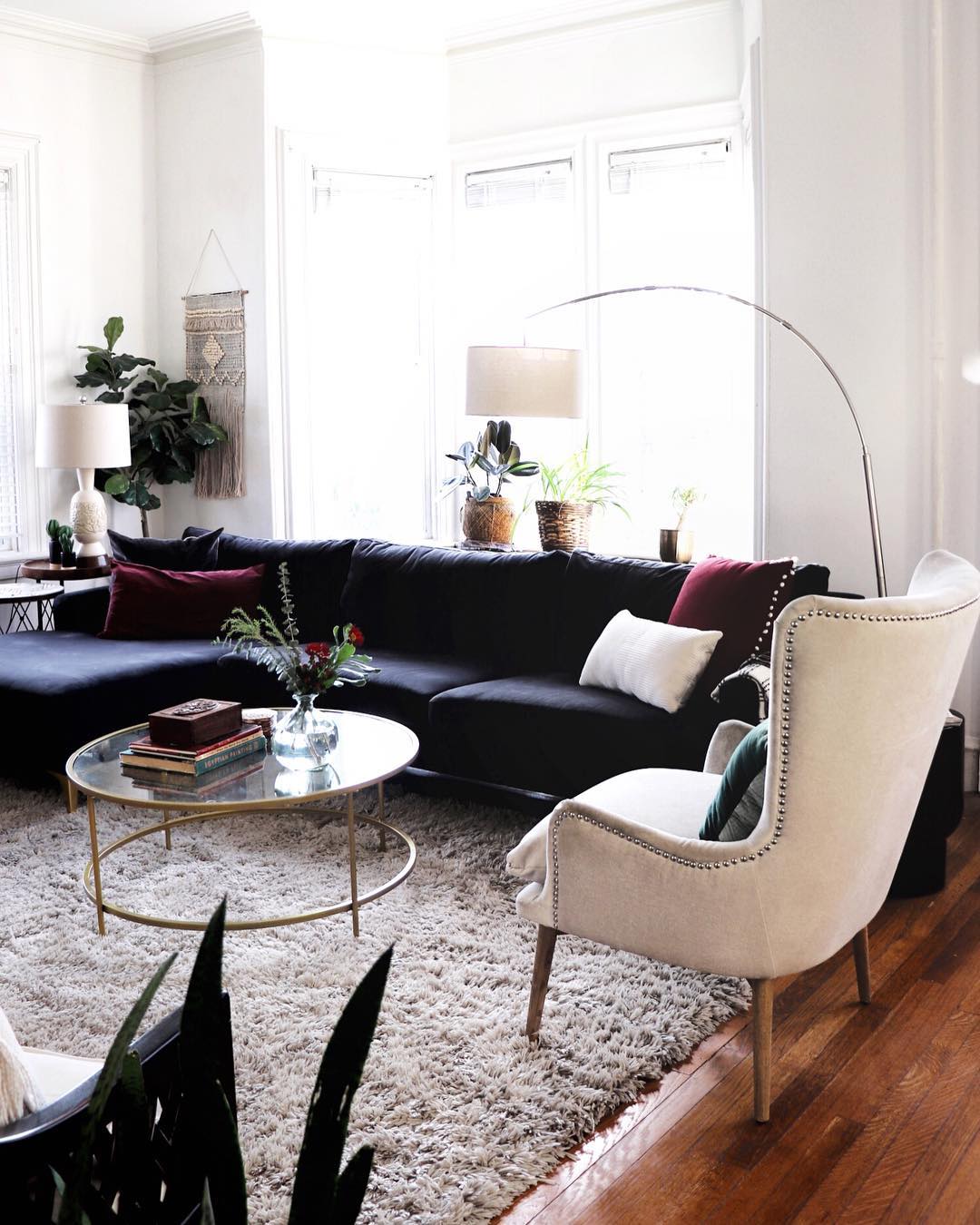 12. Set a Black Sectional Against Bright Windows