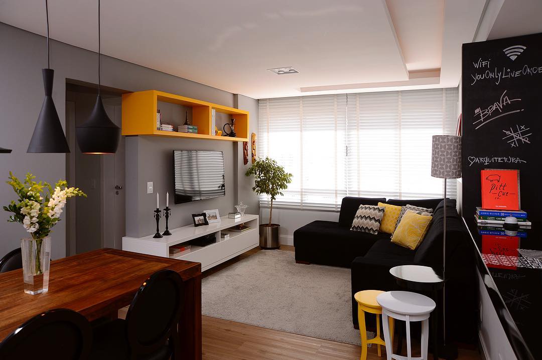 15. Add Yellow Accents to a Compact Black Sectional