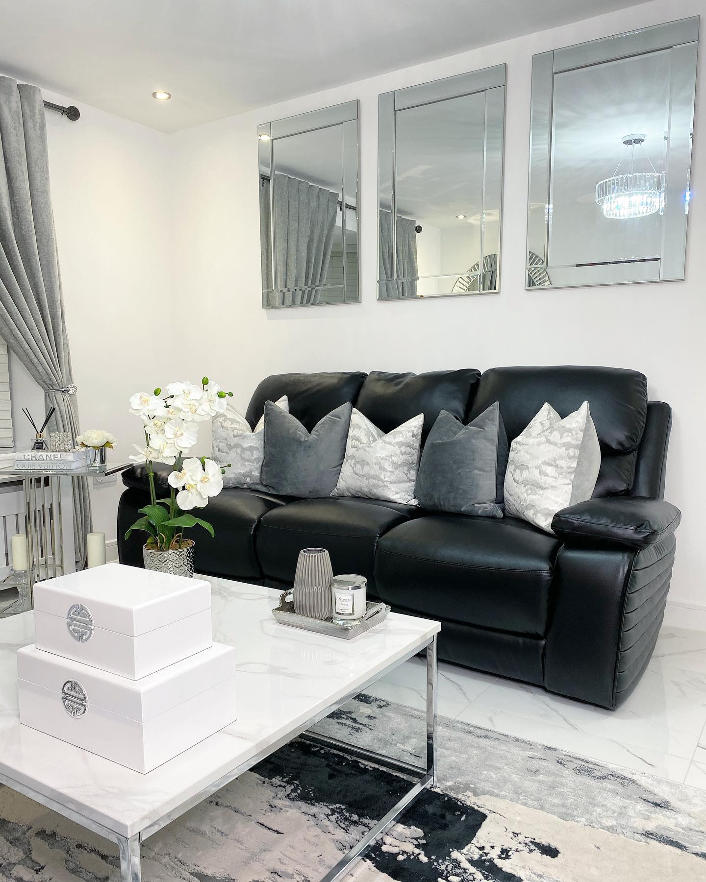 3. Reflect Light Above a Black Leather Sofa