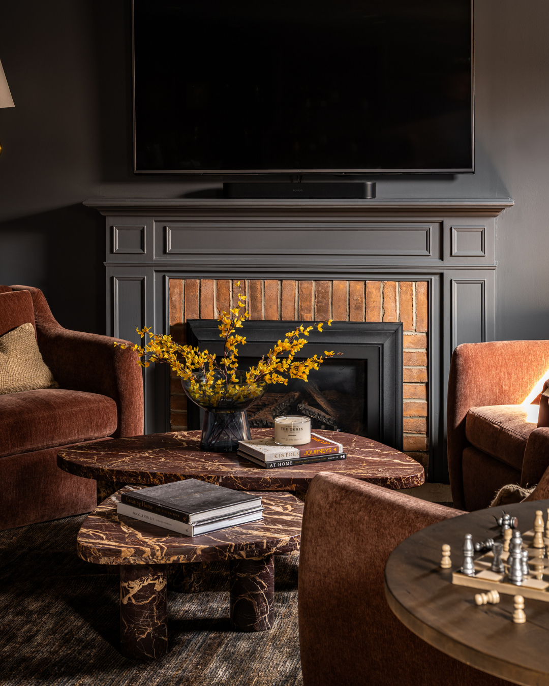 11. Add Rust Upholstery to a Charcoal Lounge