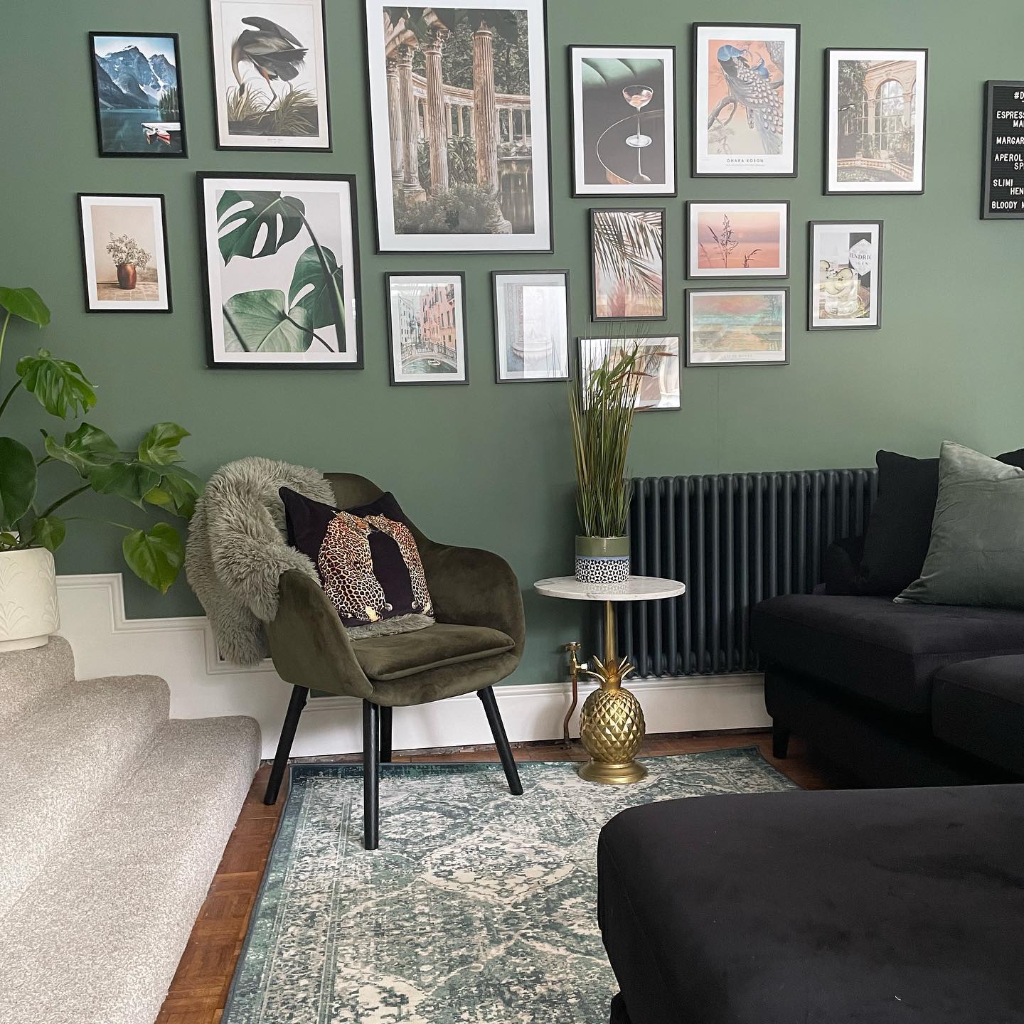 16. Repeat Black Across a Gallery Wall and Seating