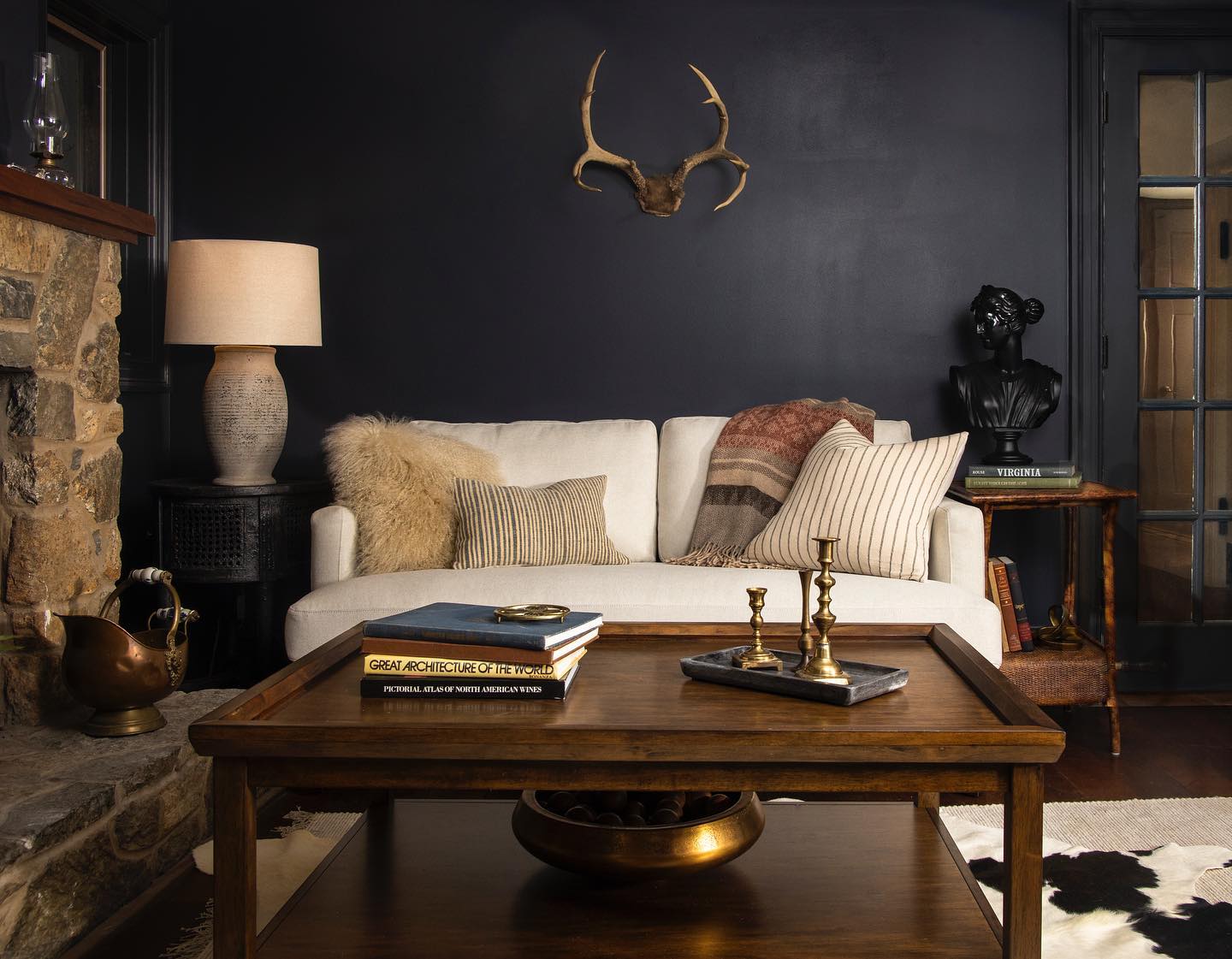 18. Balance Black Walls With Stone and Wood