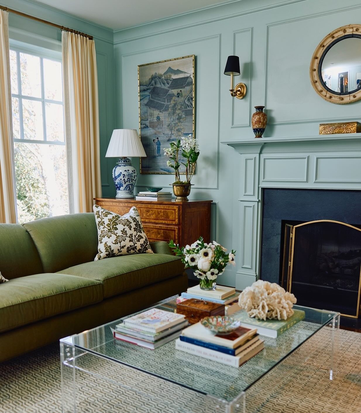 11. Olive Seating with Blue Art and Ceramics