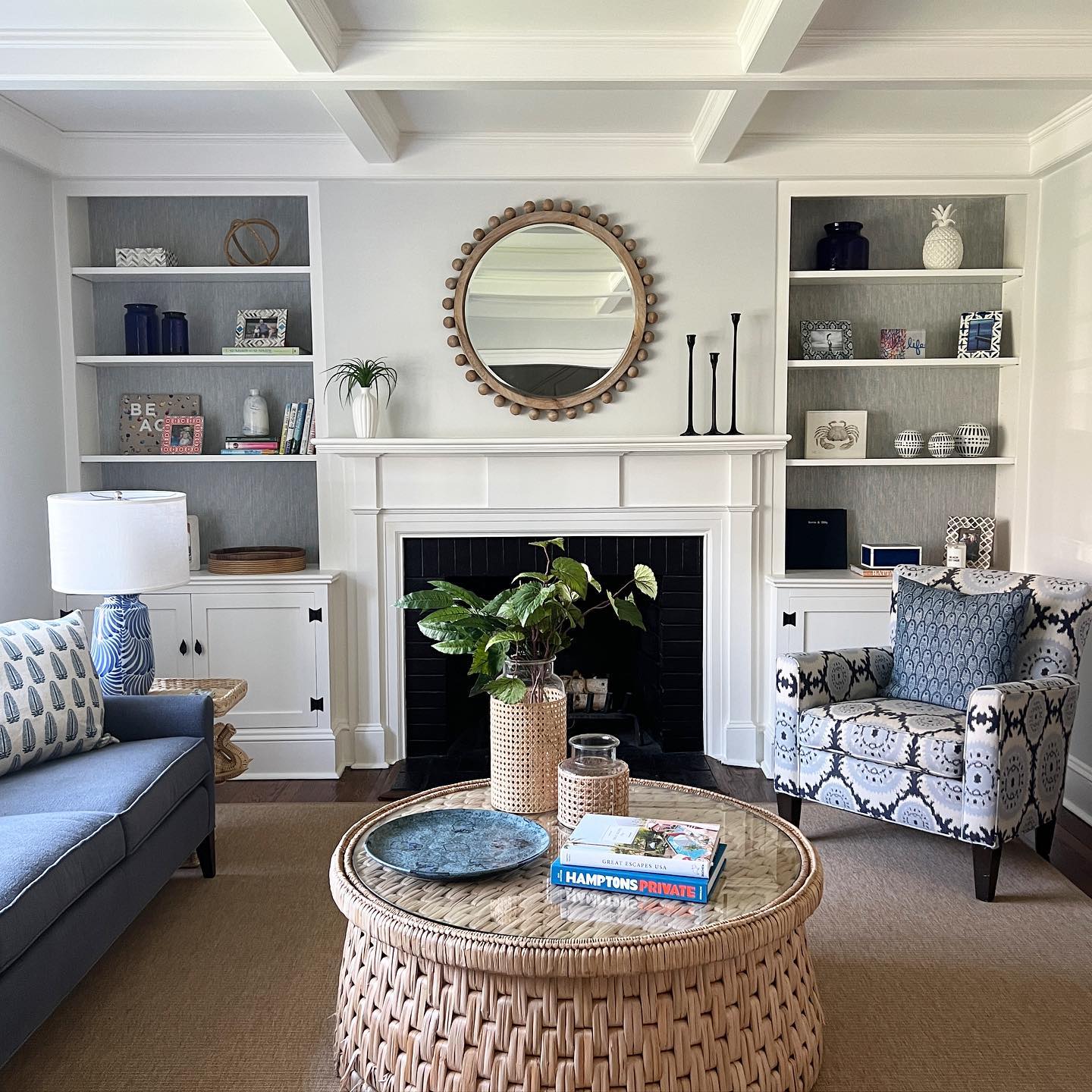 12. Soften a Symmetrical Room With a Round Woven Table