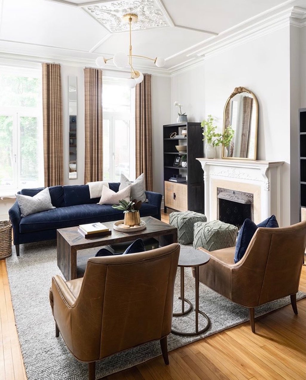 2. Anchor White Architecture with a Navy Sofa