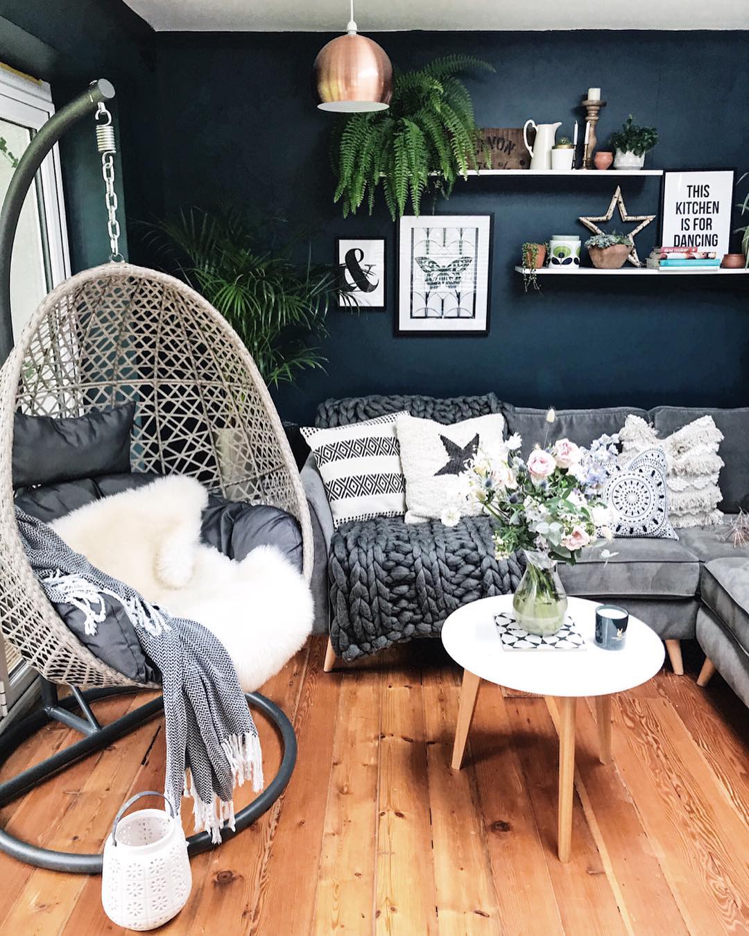 9. Soften Navy Walls with Woven Seating