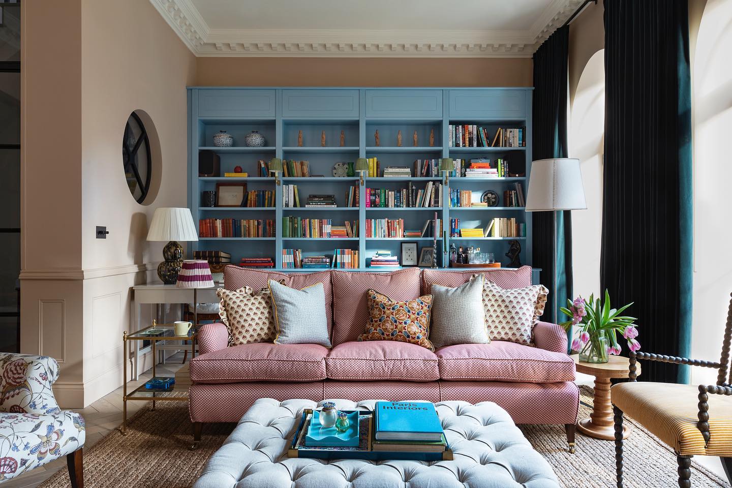 17. Turn Blue Bookcases into a Living Room Backdrop