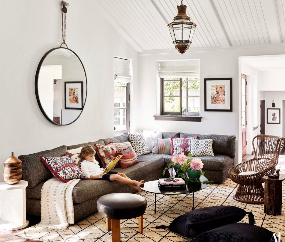 3. Mix Detailed Pillows With a Simple Geometric Rug