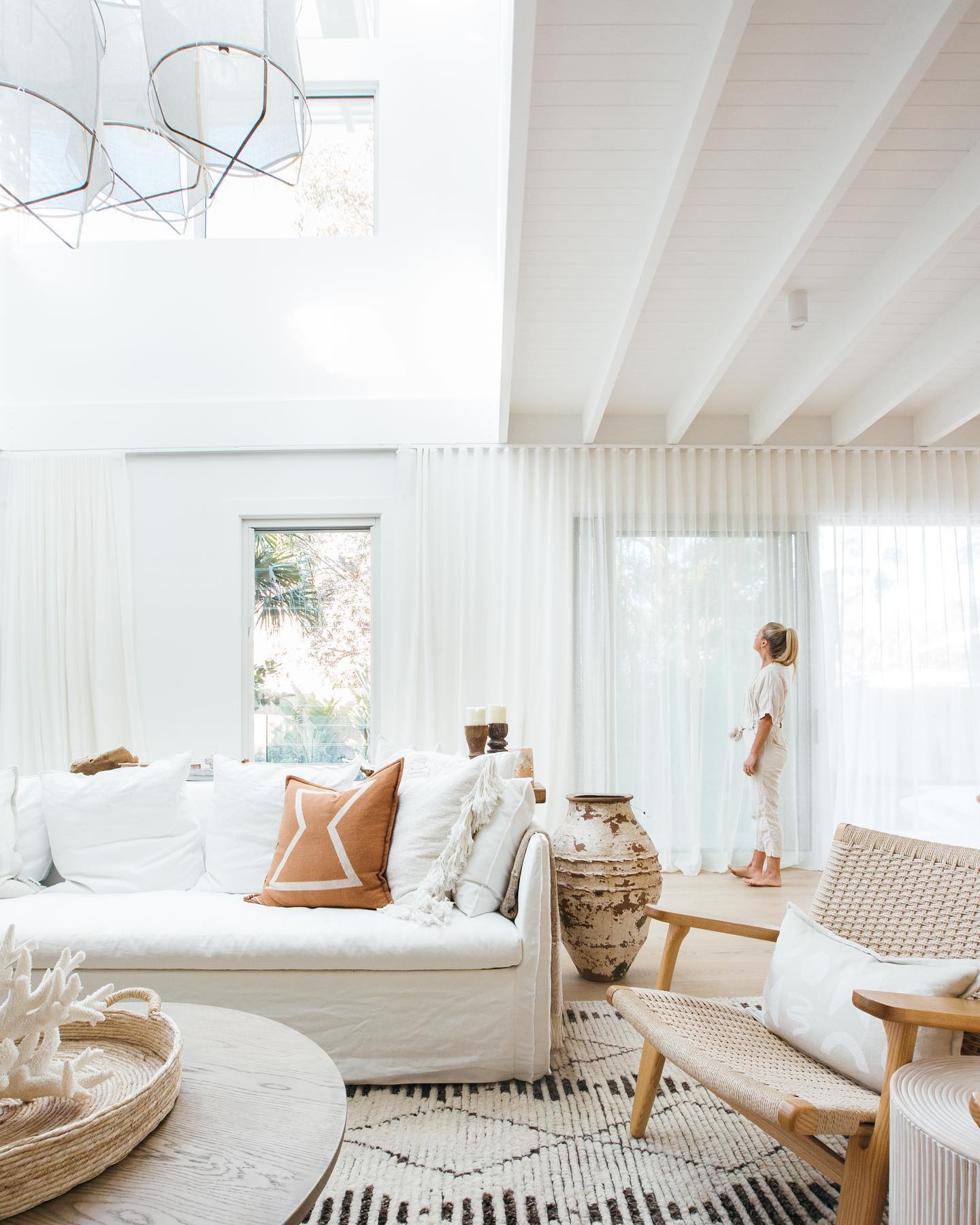 7. Warm White Seating With Sandy Sheer Curtains