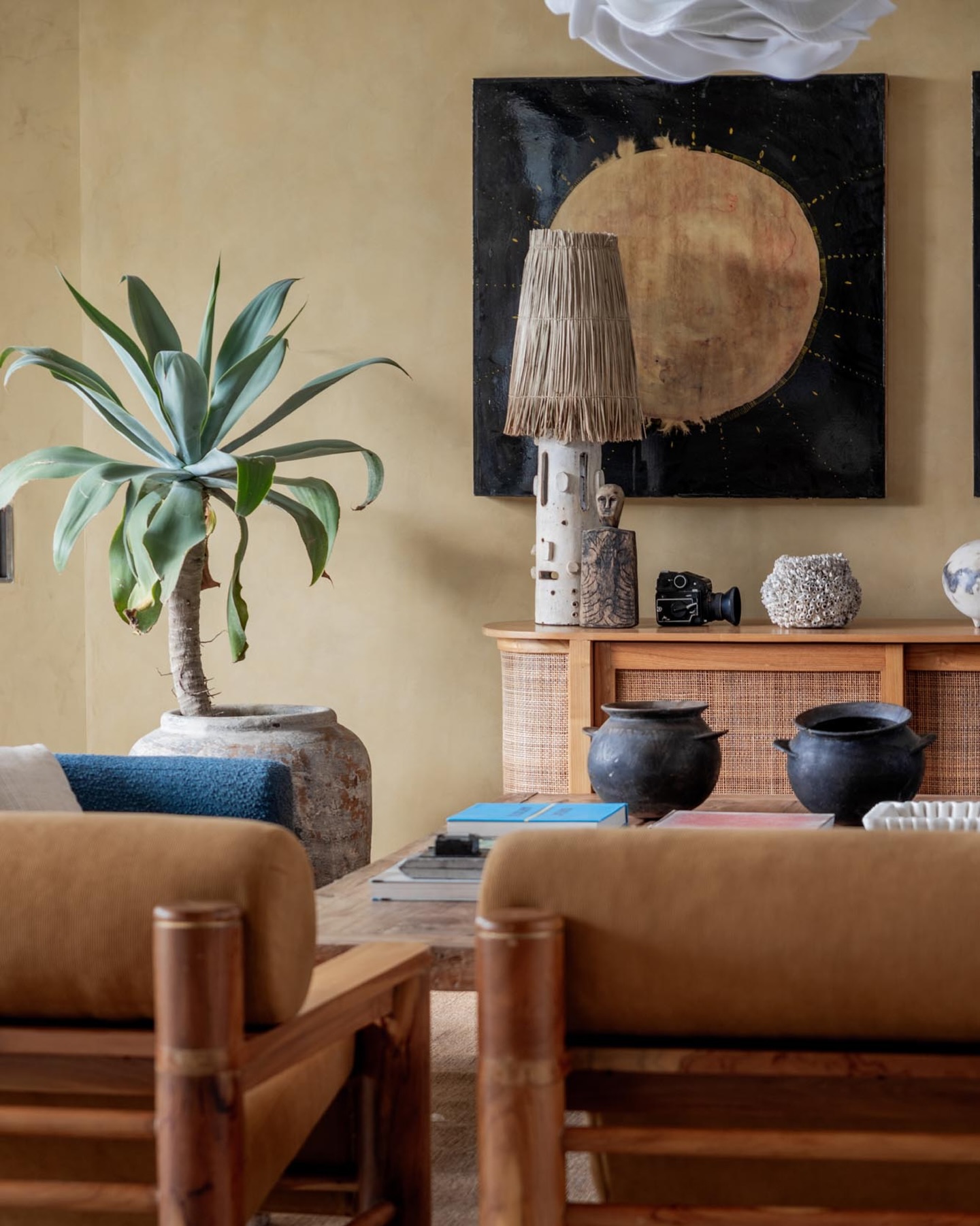 12. Vary Display Heights on a Woven Sideboard