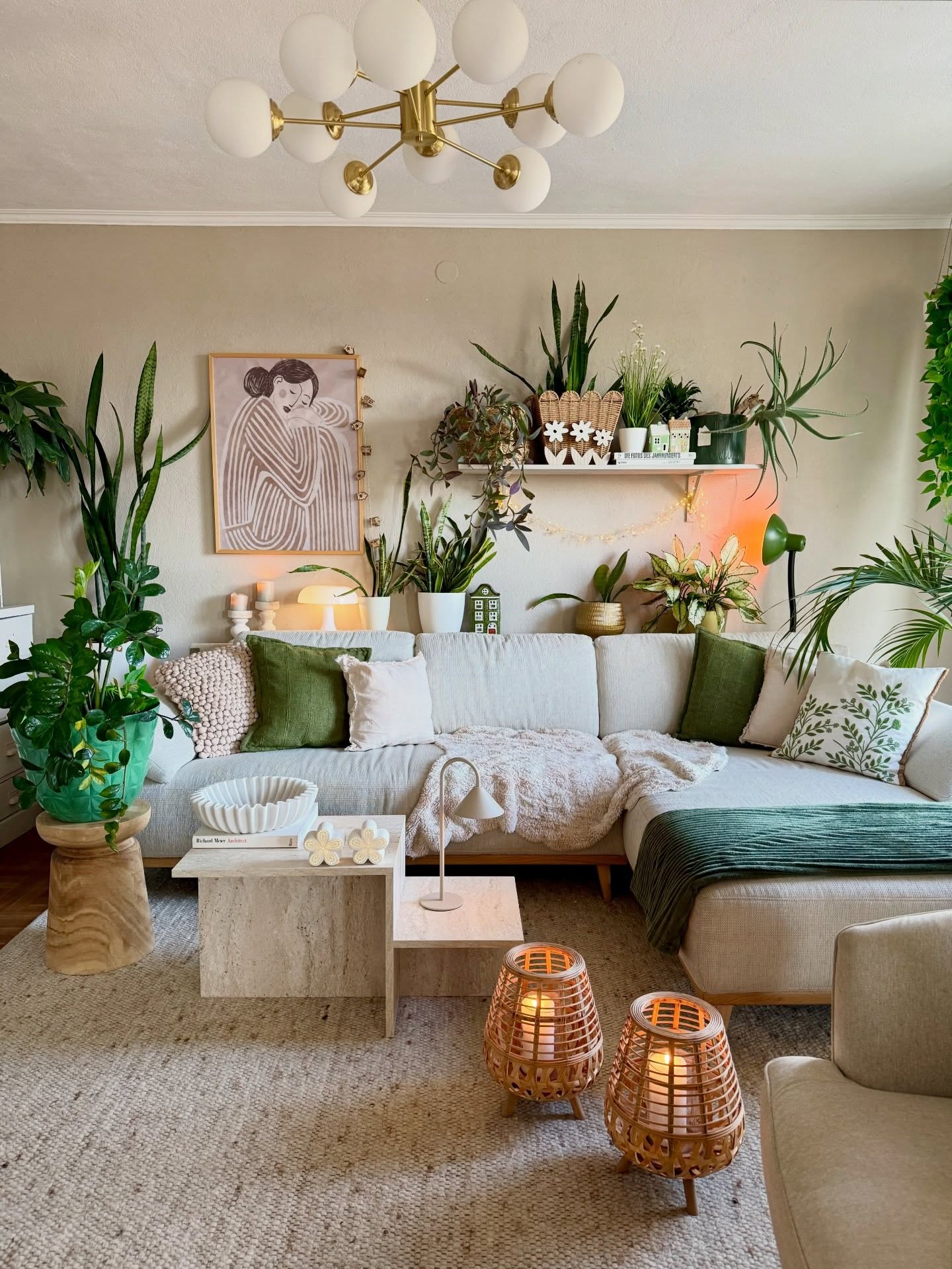 2. Crown a Plant Filled Room With a Gold Chandelier