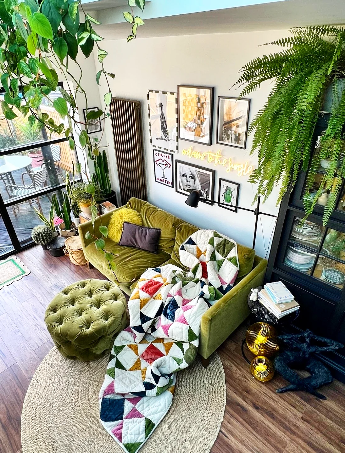 11. Add Golden Accents to a Green Velvet Nook