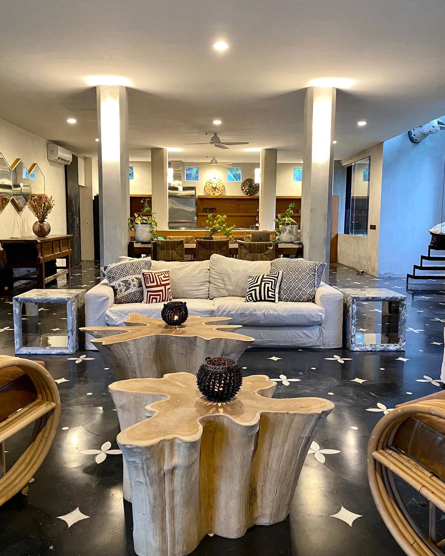 6. Use Two Sculptural Tables to Serve Separate Seats