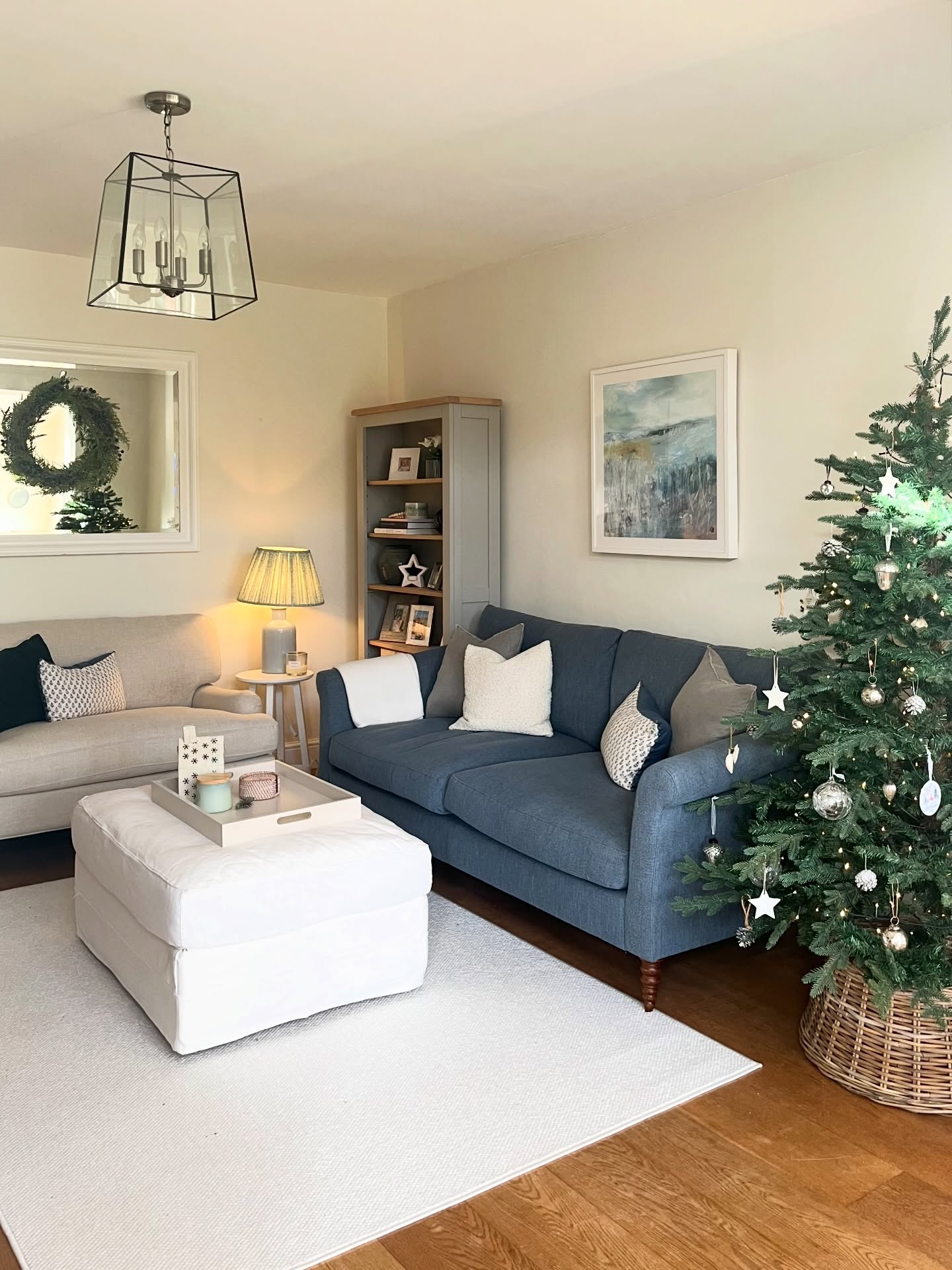 3. Pair a Blue Sofa With Warm Brown Flooring