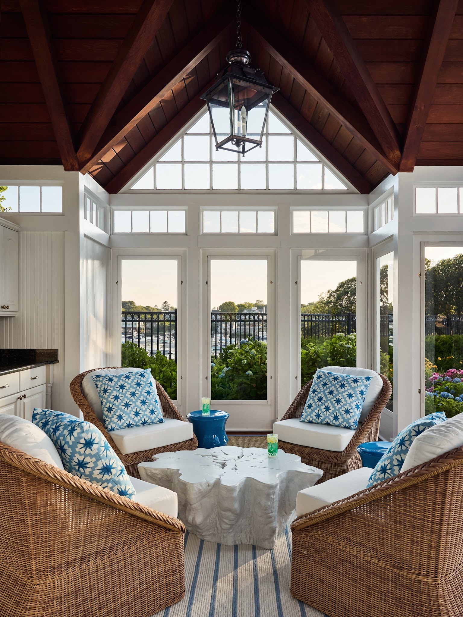 4. Freshen Wicker Chairs With Blue Patterned Pillows