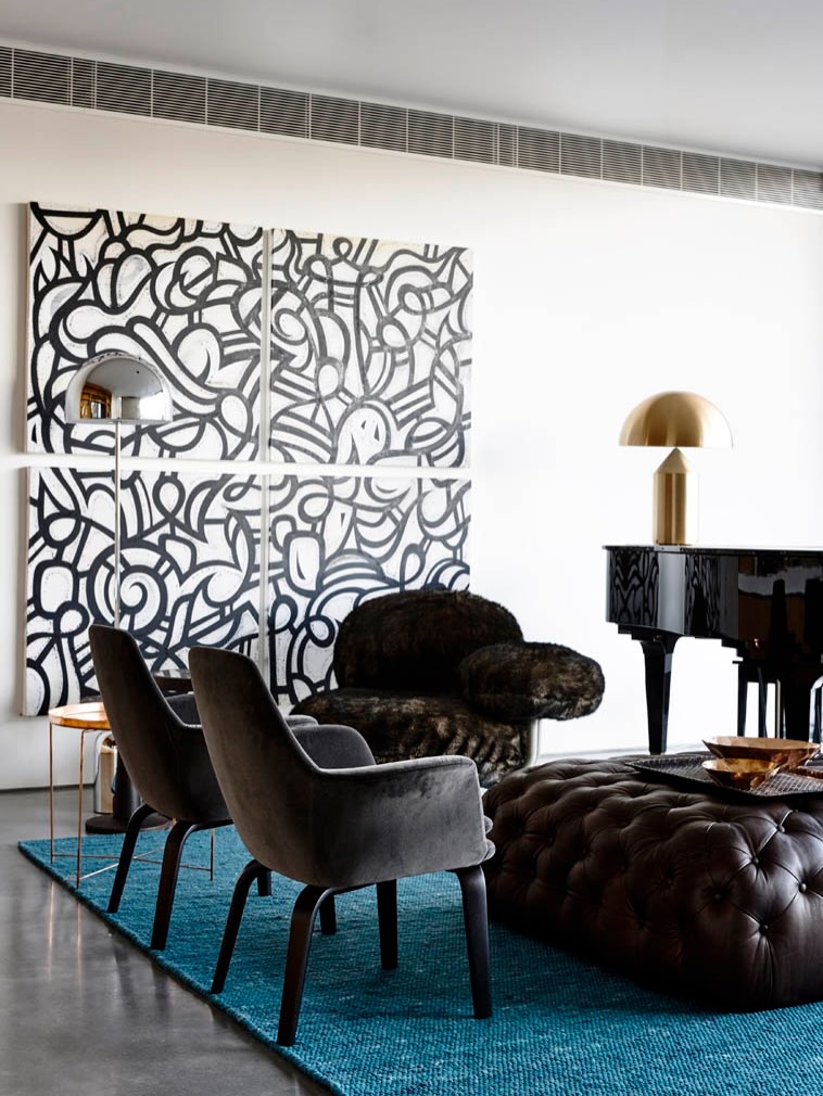 11. Put a Brown Leather Ottoman on a Blue Rug