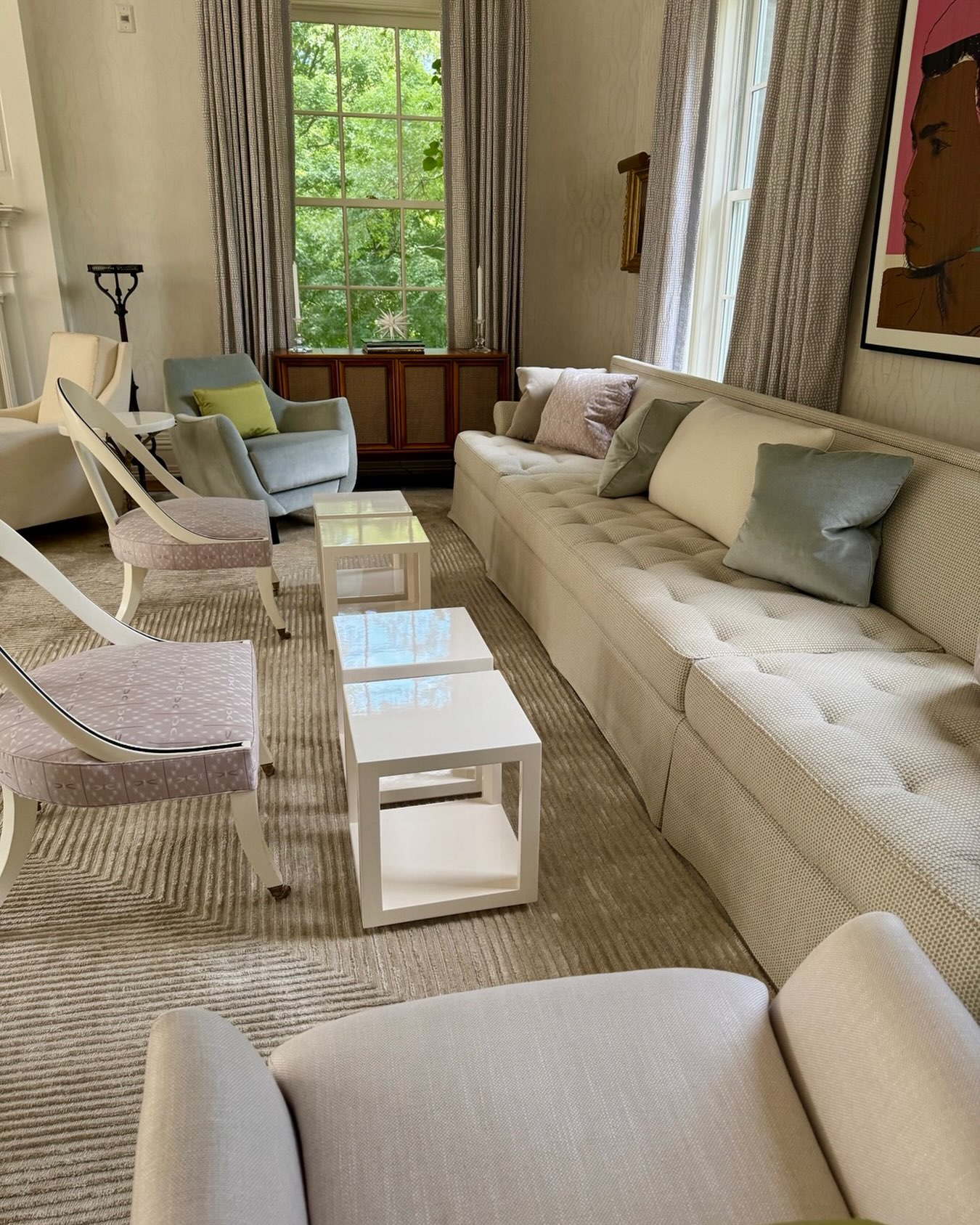 18. Layer Pale Blue Accents Over a Brown Patterned Rug