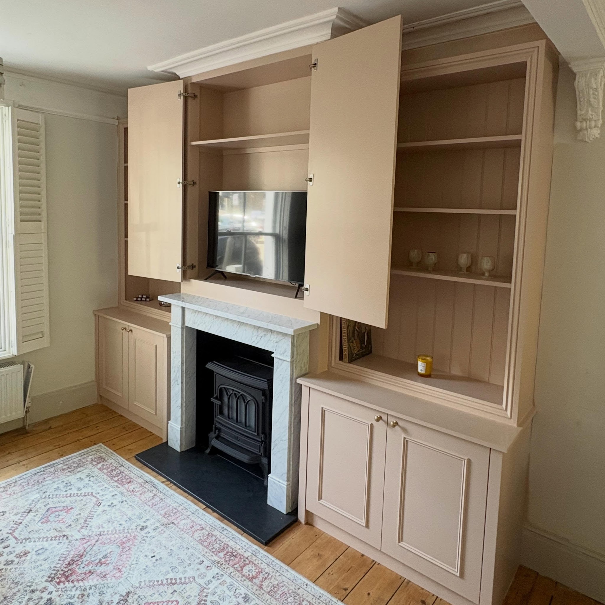 7. Hide the Television Behind Cabinet Doors