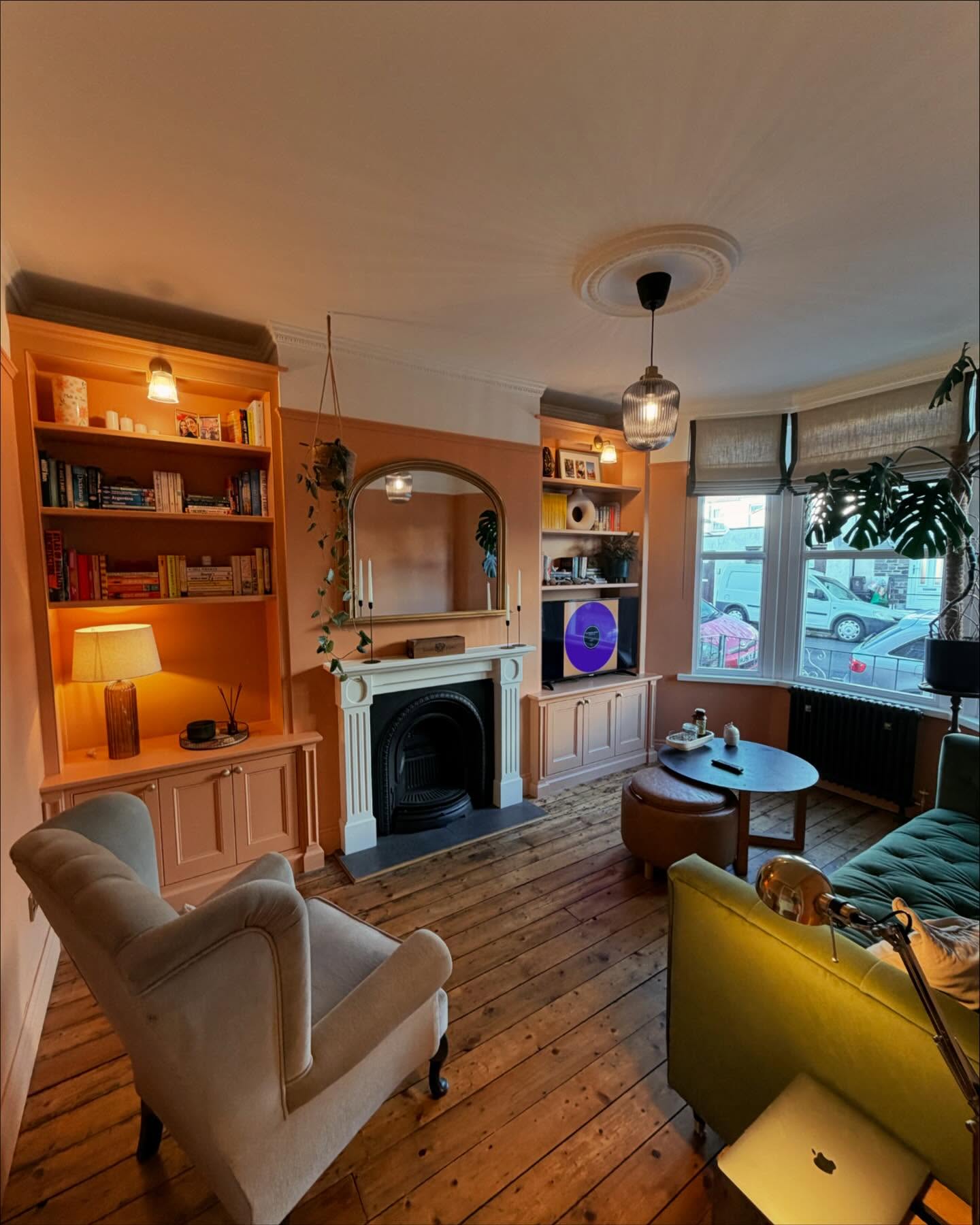 18. Bring a Warm Color Into the Bookcases