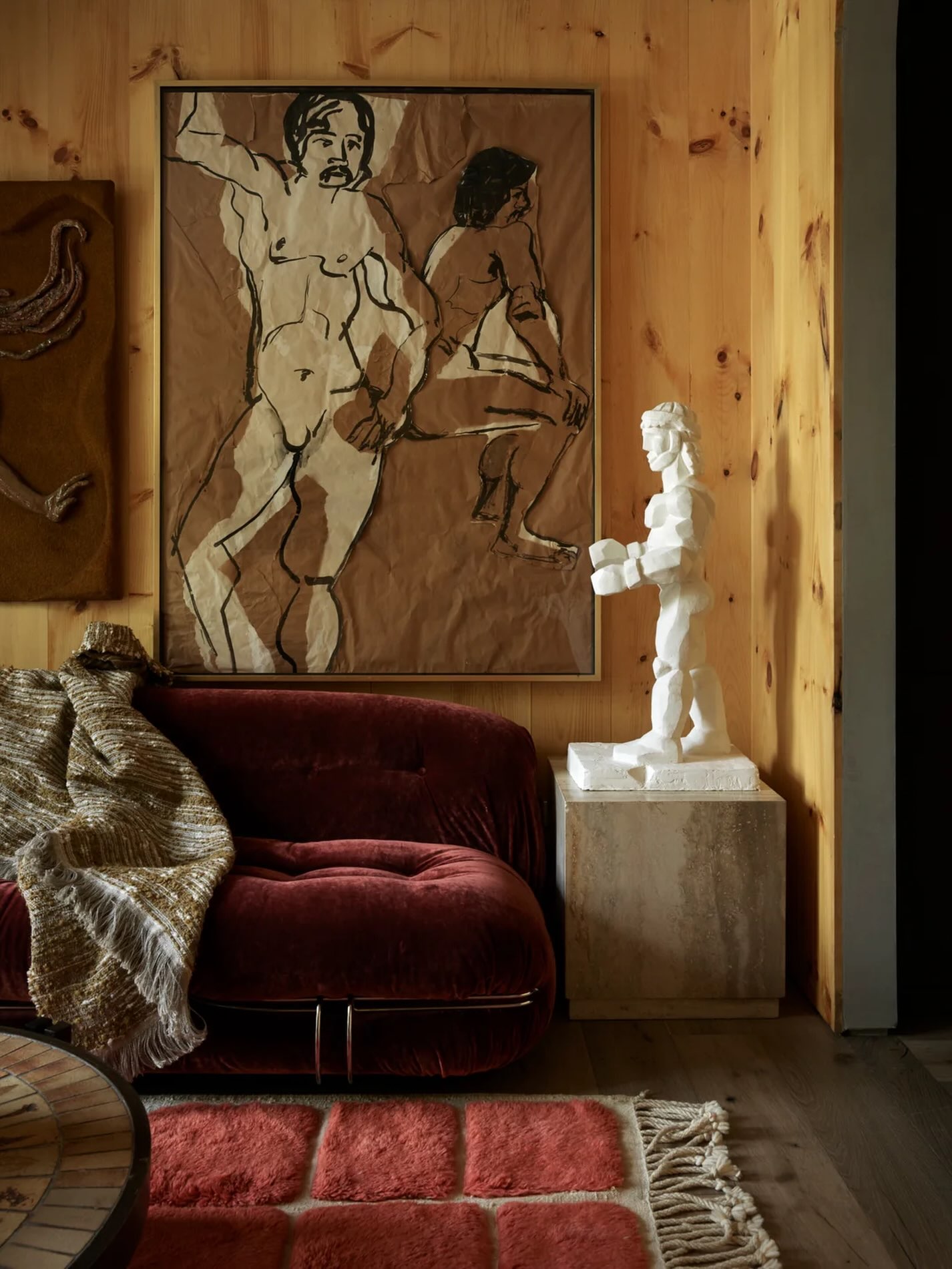 8. Set Burgundy Velvet Against Natural Wood Walls