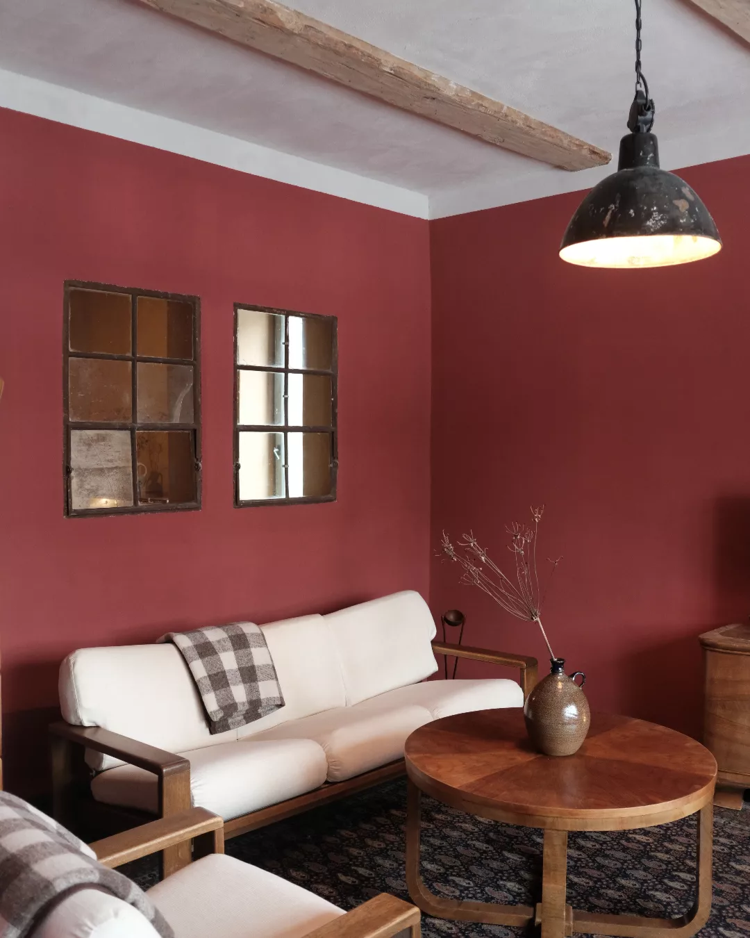 9. Combine Wine Red Walls with Simple Wood Furniture