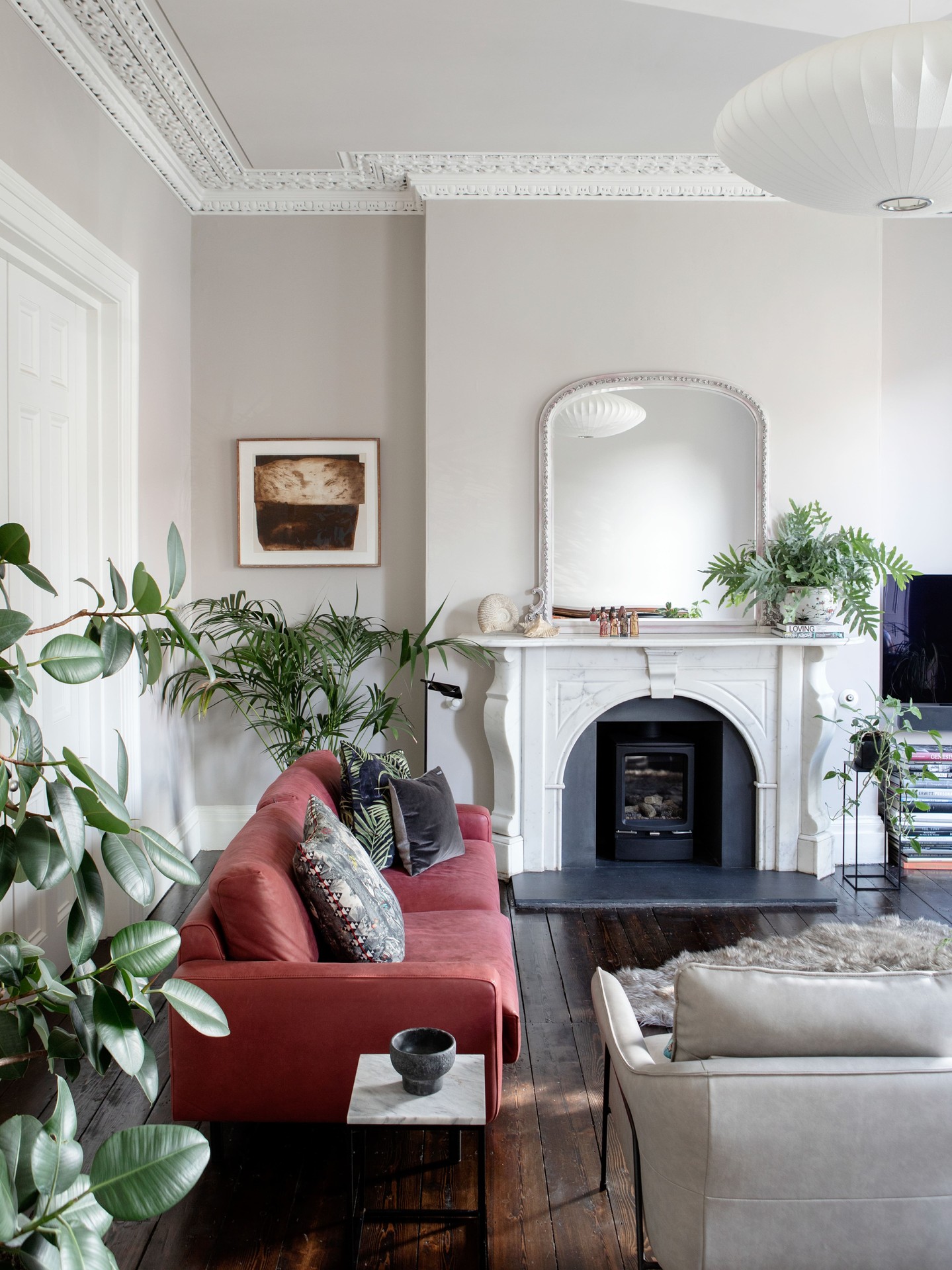 11. Use a Burgundy Sofa in a Pale Period Room