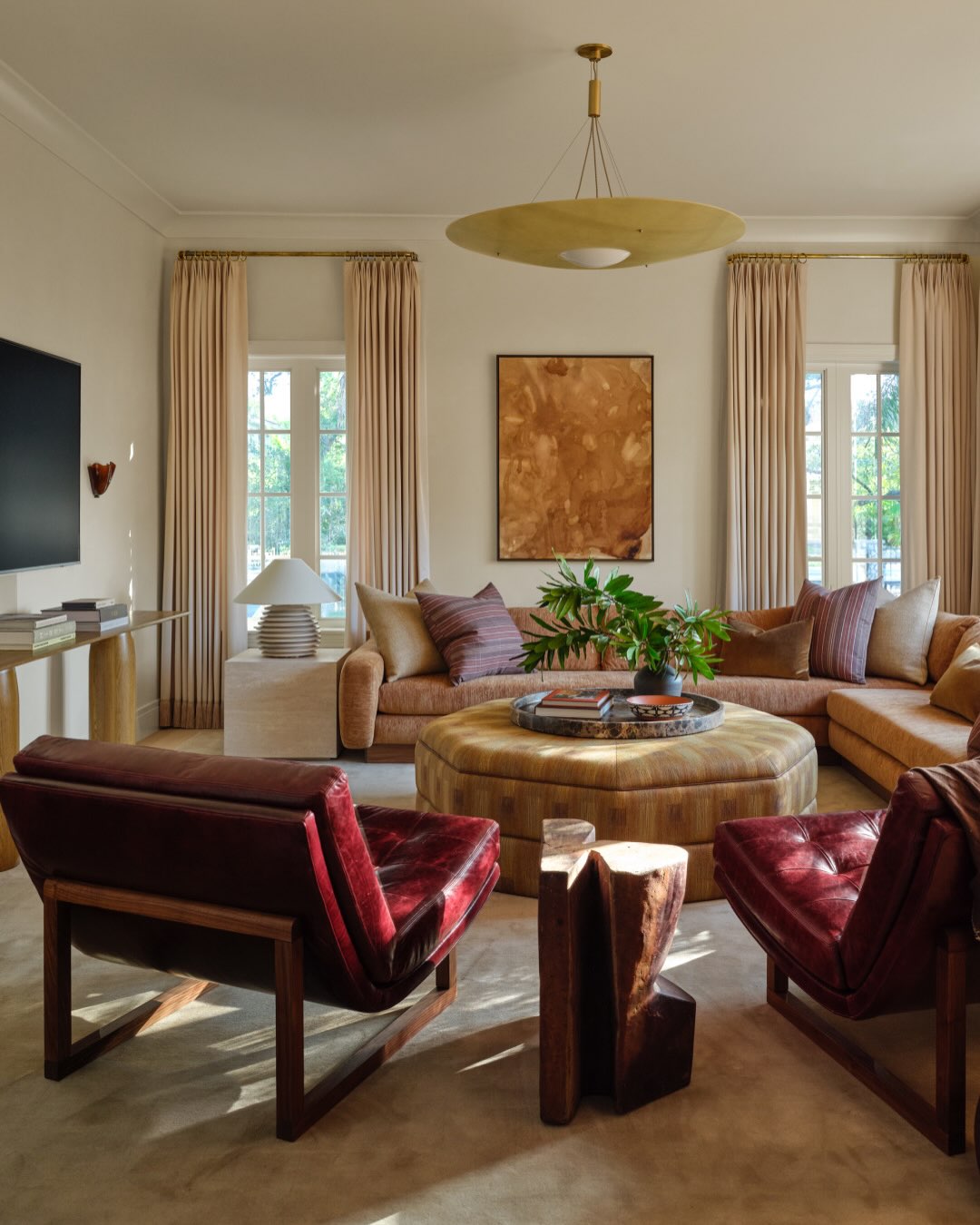 18. Introduce Burgundy Through a Pair of Lounge Chairs