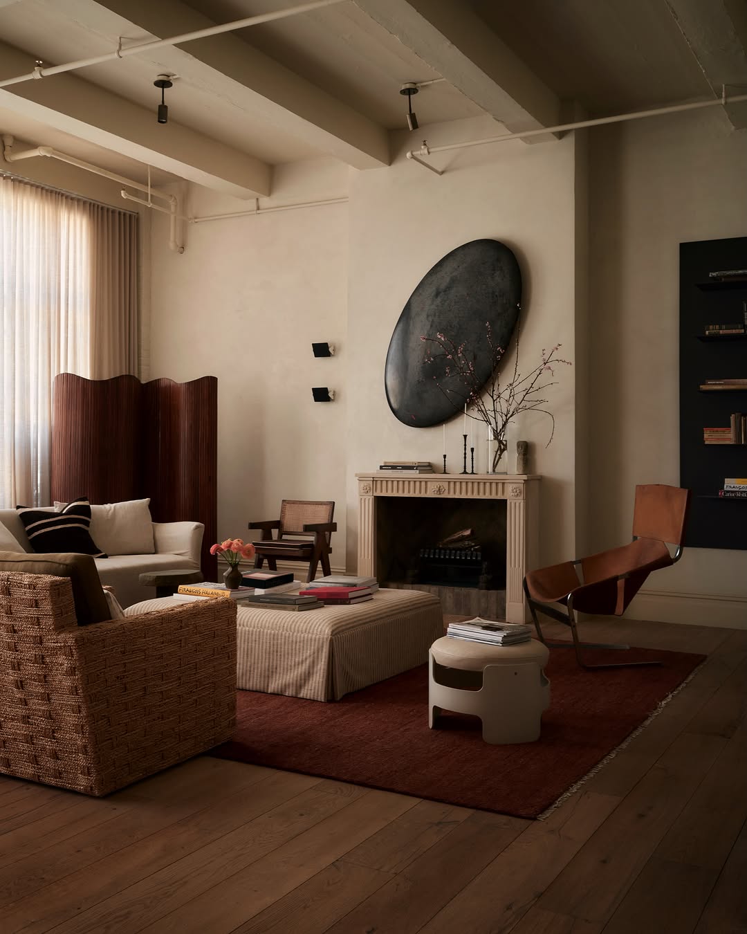 19. Anchor Pale Furniture with a Muted Burgundy Rug