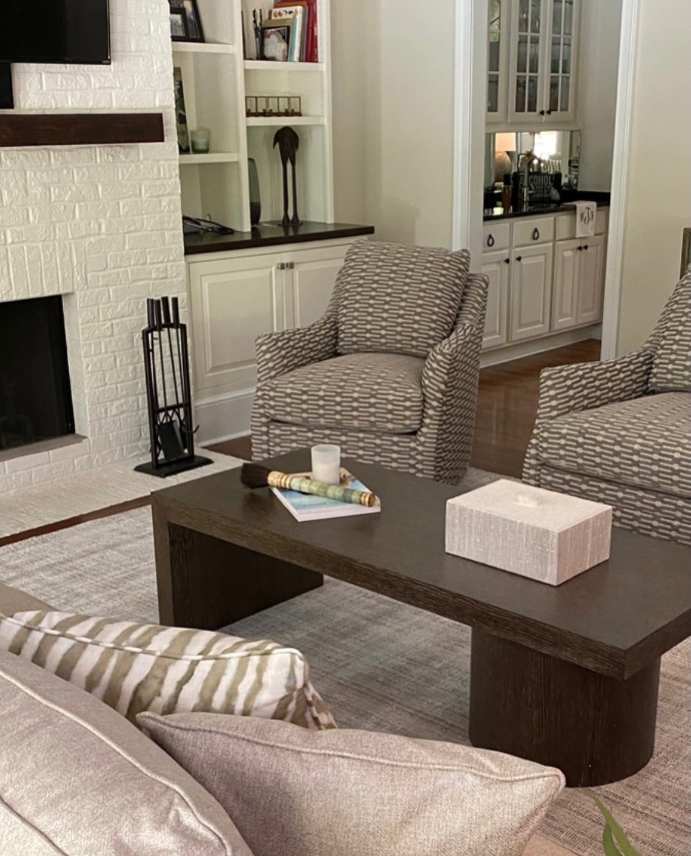 19. Pair Patterned Chairs With a Simple Central Table