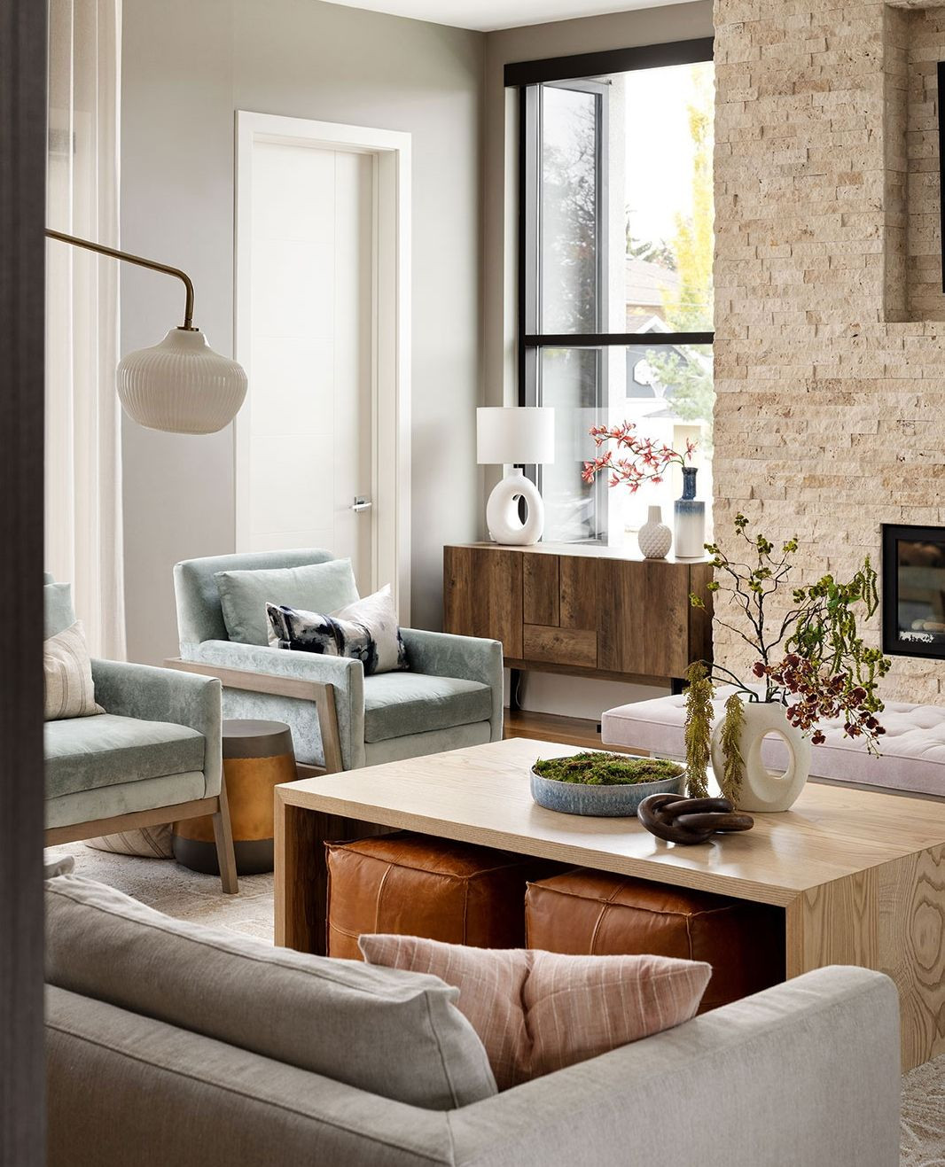 6. Tuck Compact Ottomans Beneath the Coffee Table