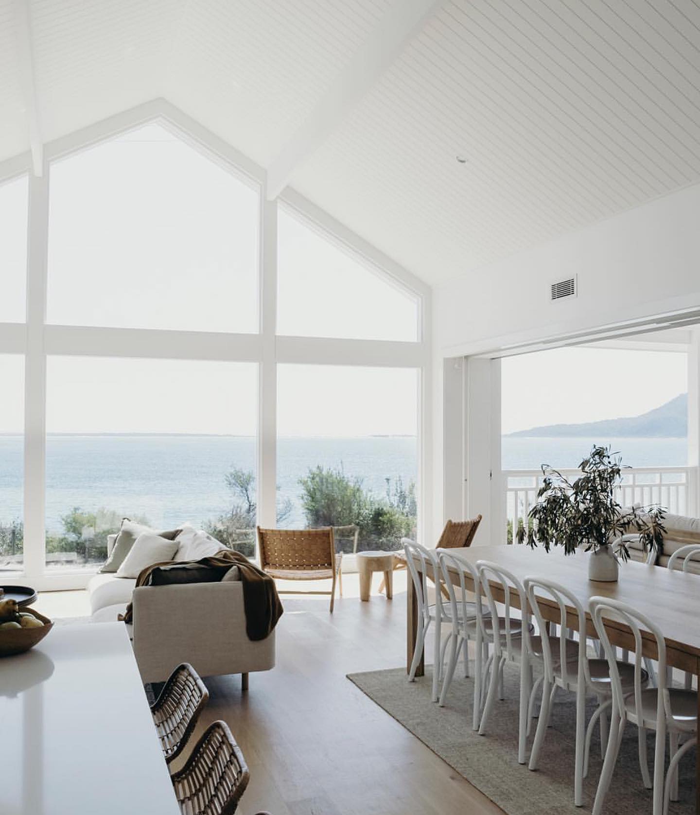 7. Keep Seating Low Beneath a Tall Window