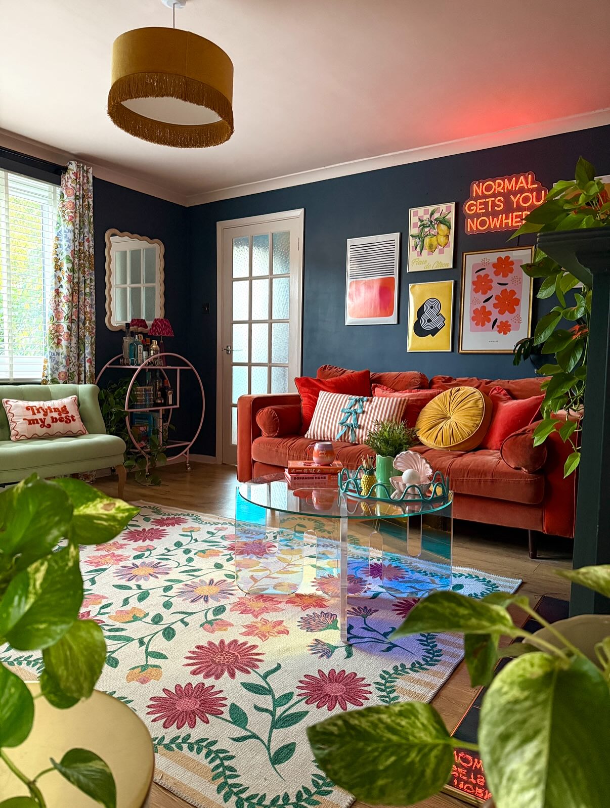 11. Let a Floral Rug Show Through a Clear Table