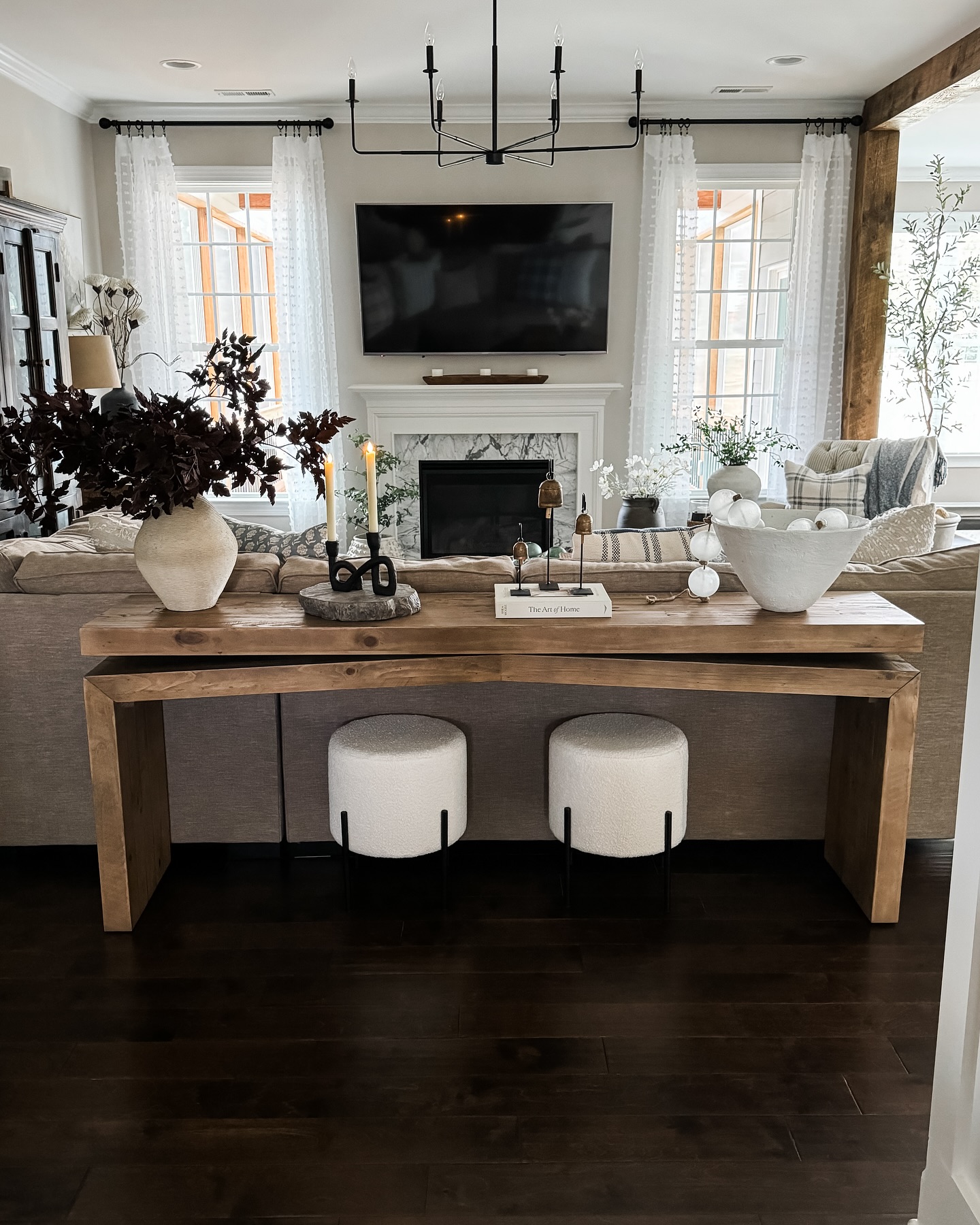 3. Tuck Round Stools Under a Broad Wood Table