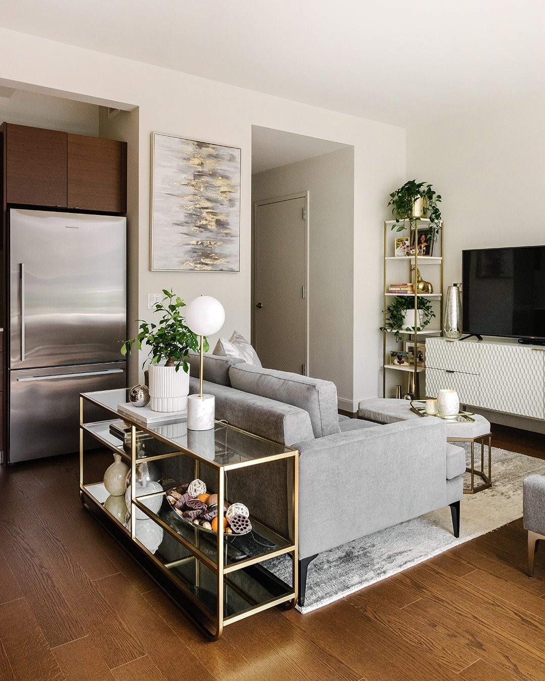 4. Use Open Shelving to Define a Compact Lounge