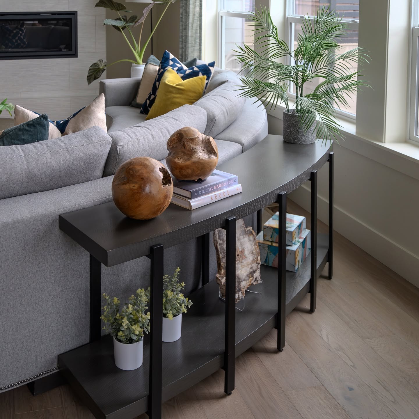 10. Follow a Curved Sofa With a Matching Console