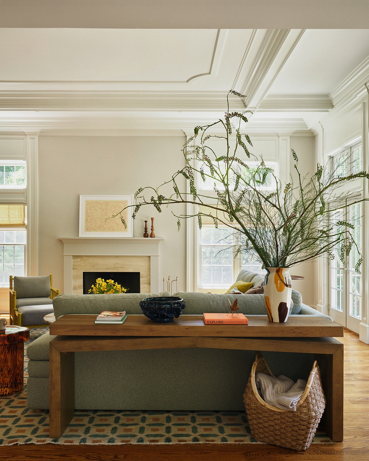 16. A Layered Wood Console With One Basket