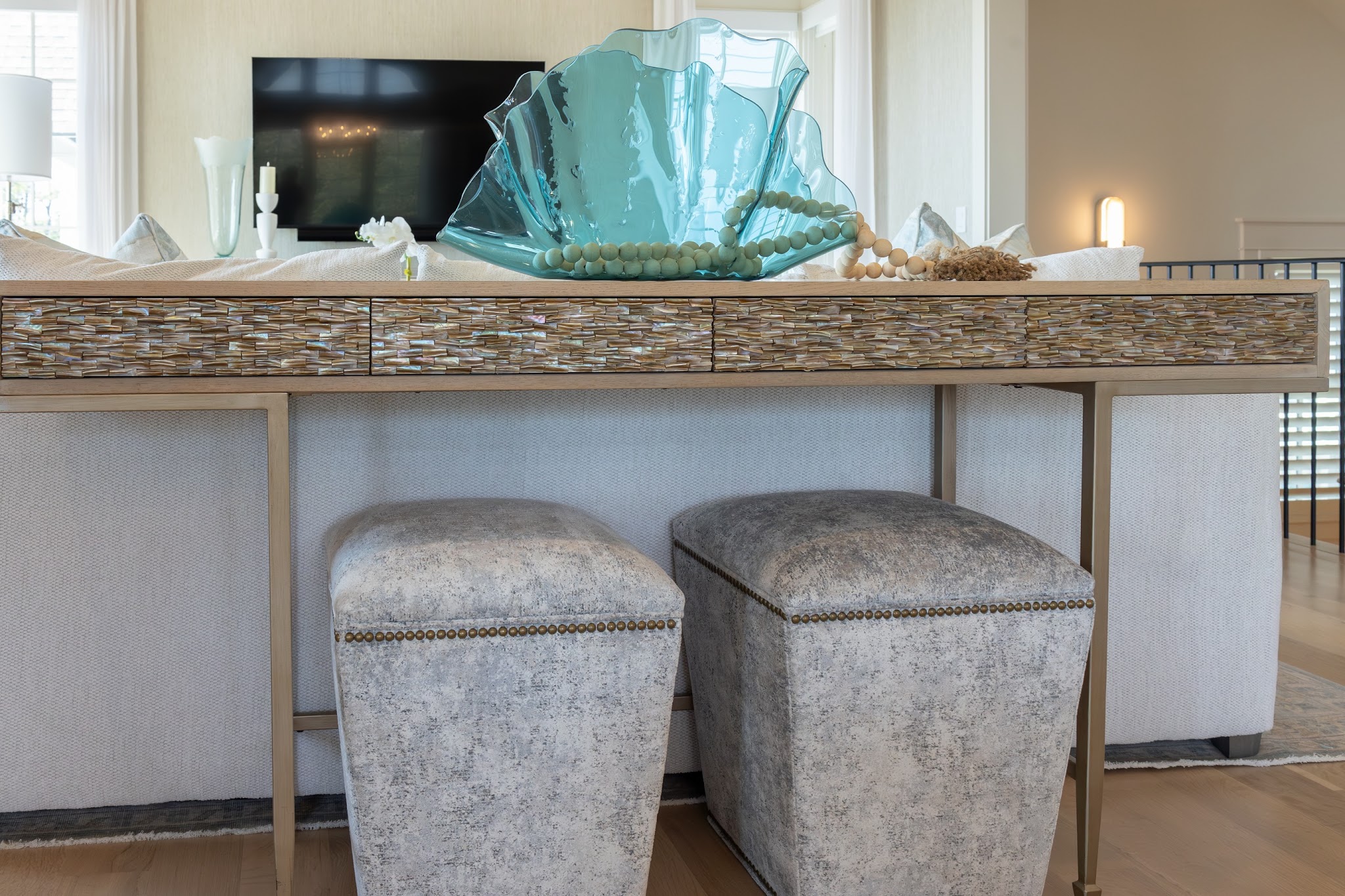 20. An Iridescent Console With Tucked Stools