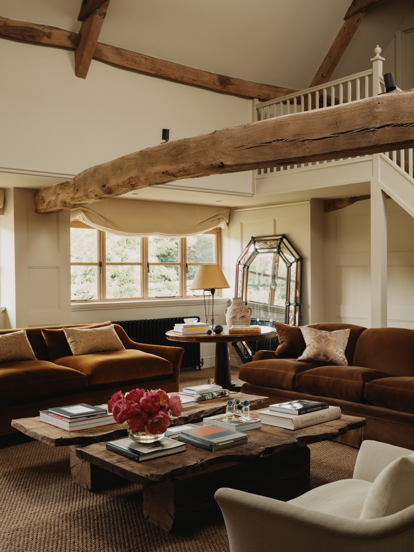 6. Low Seating Beneath Weathered Barn Beams