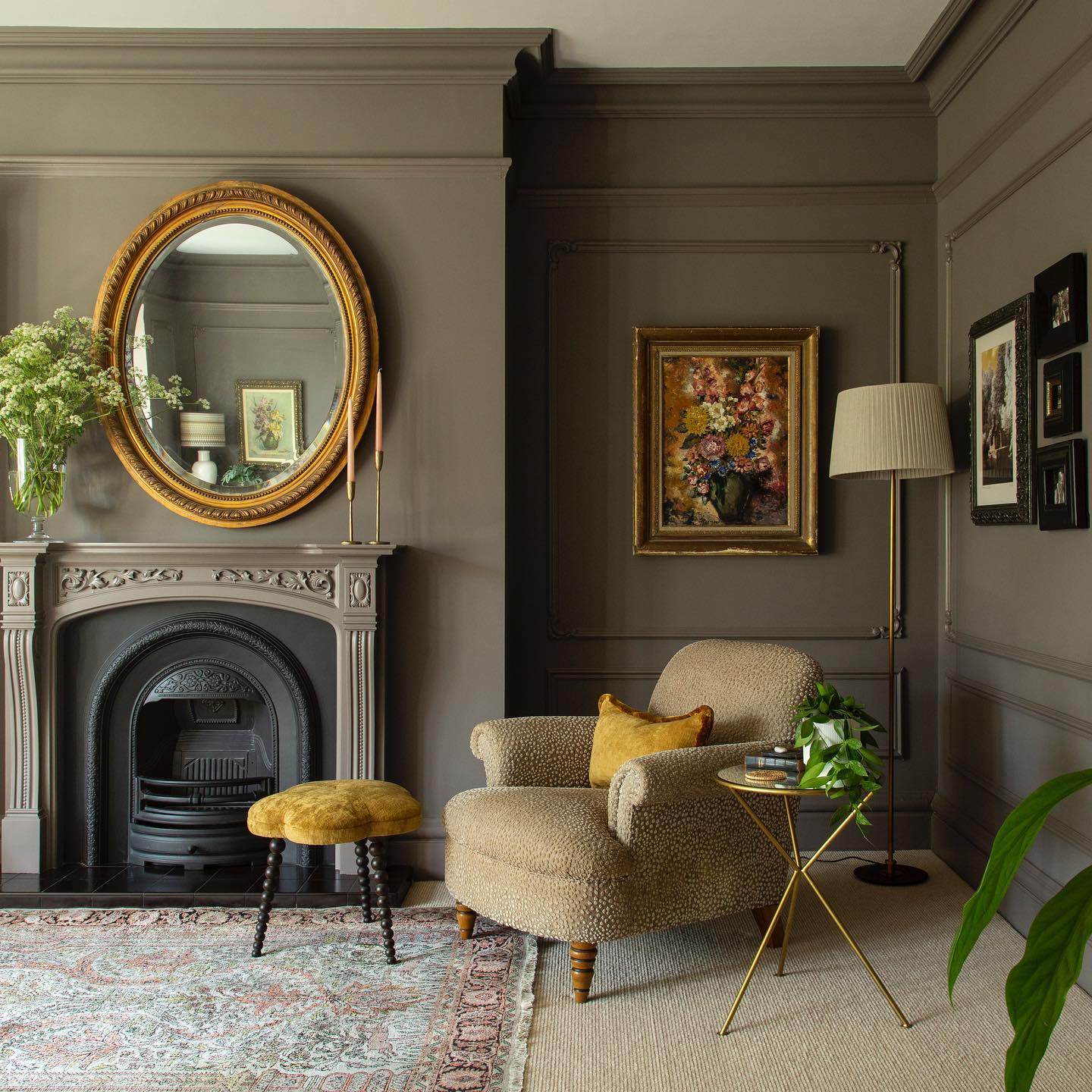 7. Olive Walls and an Antique-Style Mirror