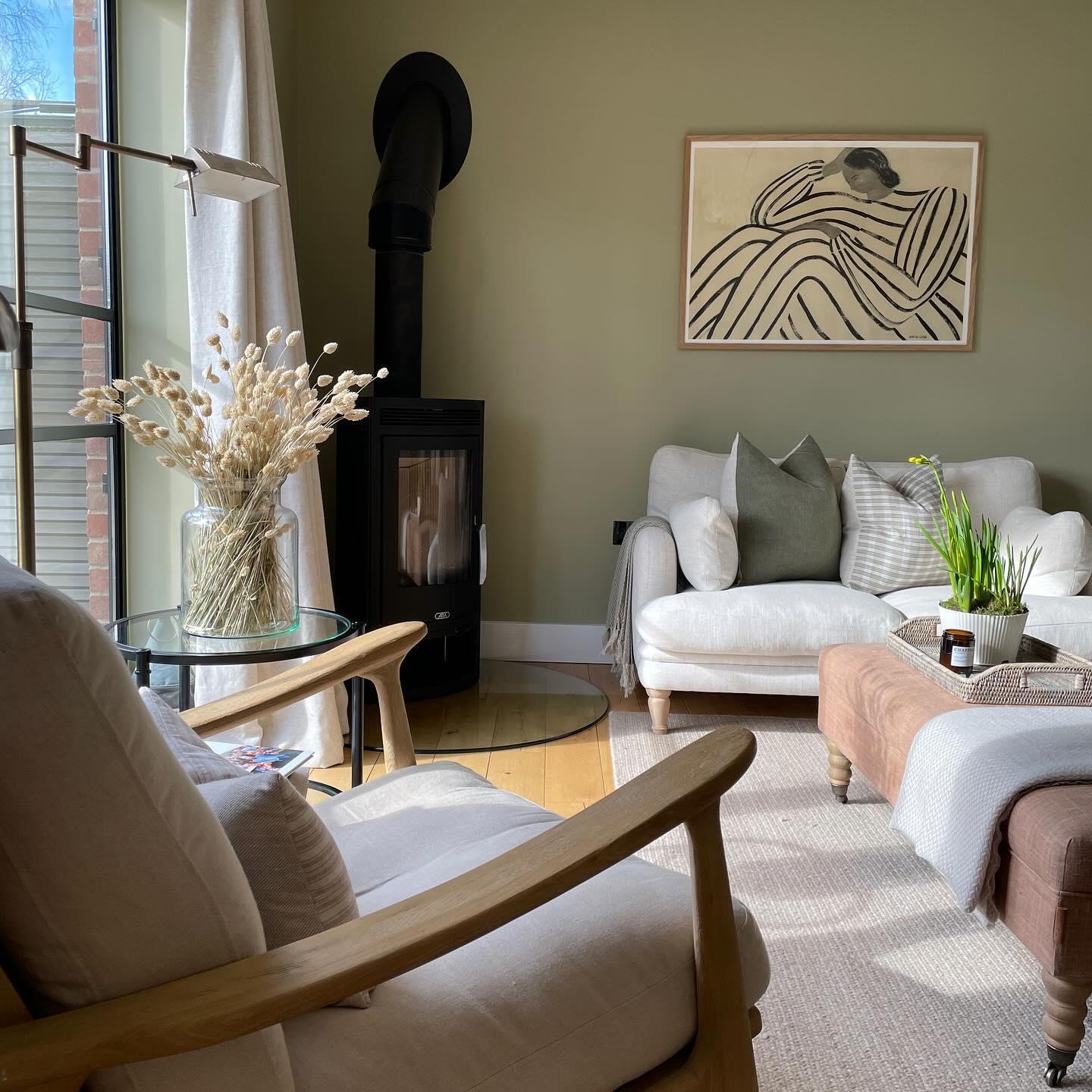 14. An Olive Green Nook with Simple Seating