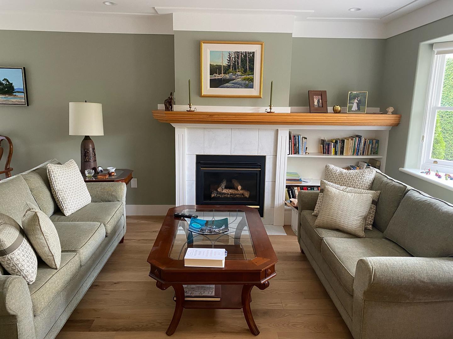 4. Pair Soft Sage Walls With Warm Wood