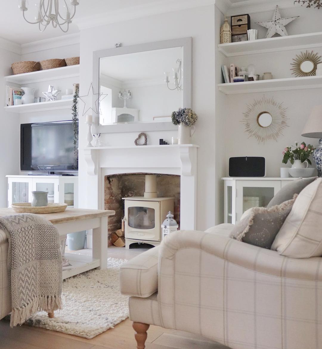 13. Settle the Fireplace Wall With Glass-Front Storage
