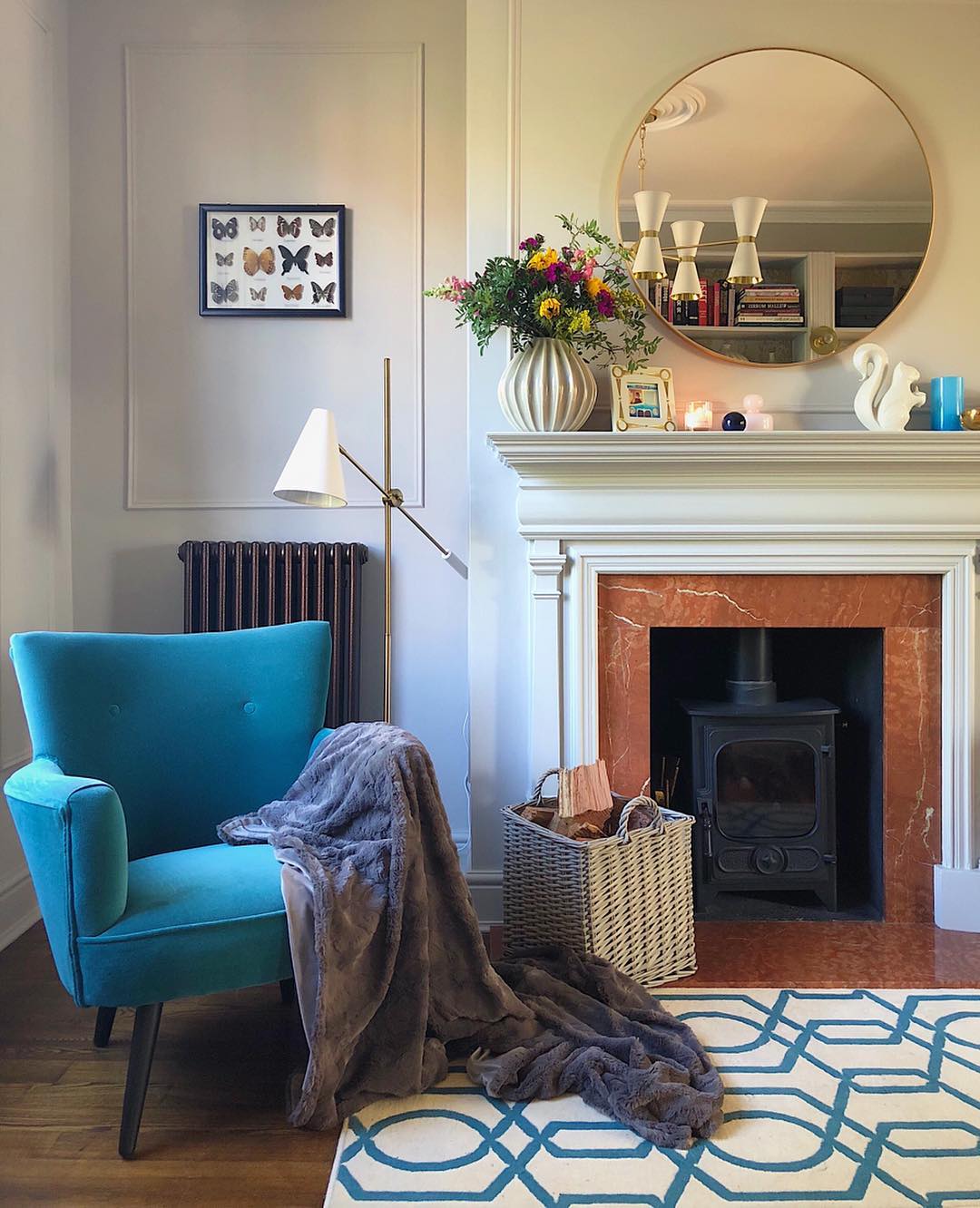 20. Balance a Teal Accent With Warm Fireplace Color
