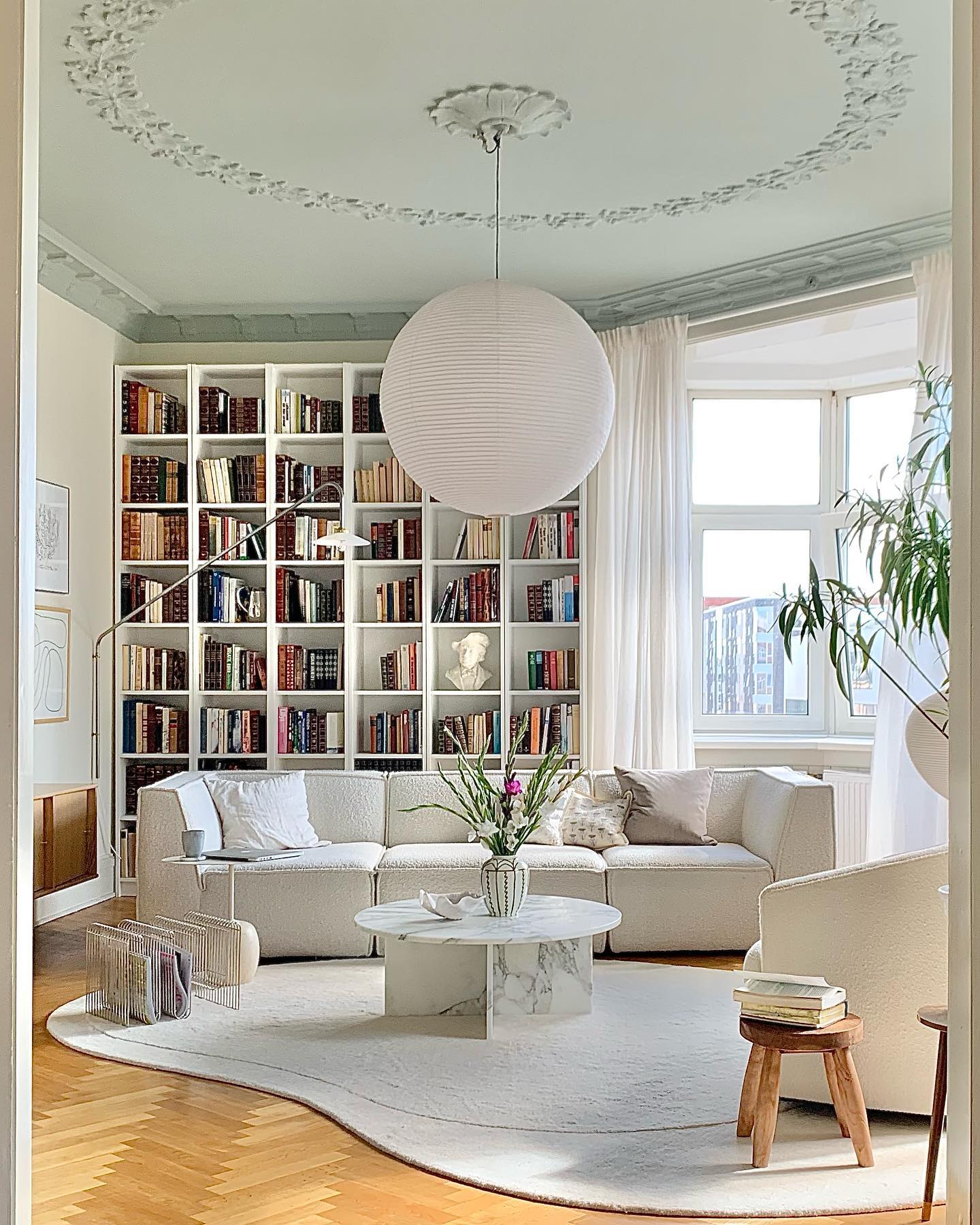 Define a Library Reading Area with a Shaped Rug