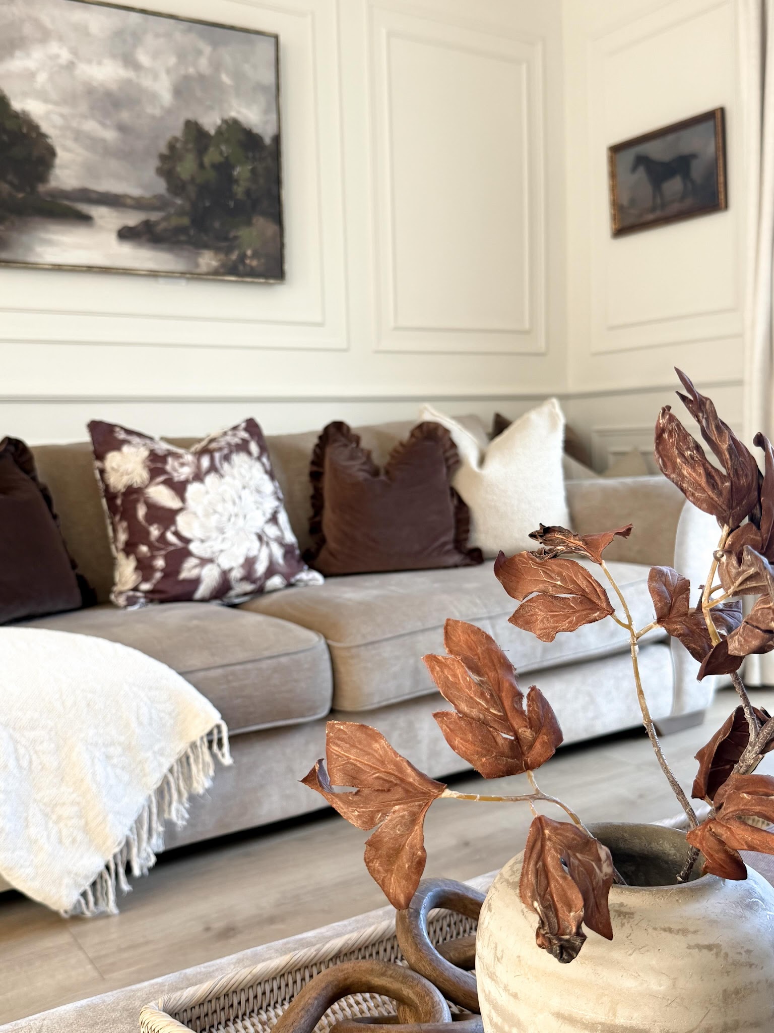 2. Deepen Beige With Brown Pillows