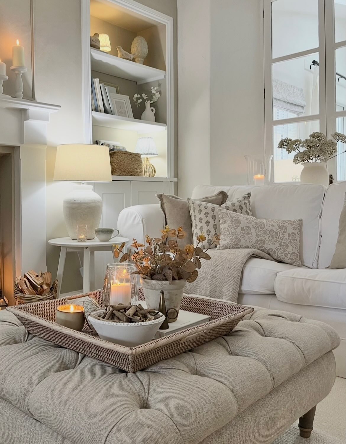 3. Center the Room on a Tufted Ottoman