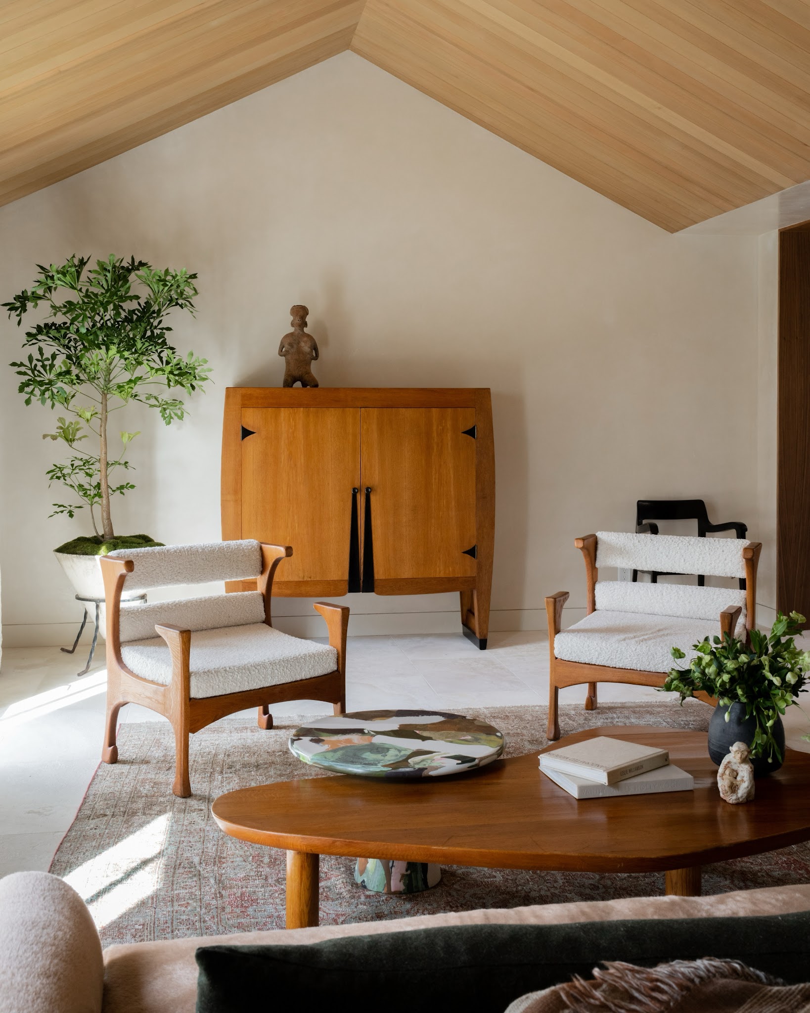 14. Balance Cream Upholstery With Warm Wood