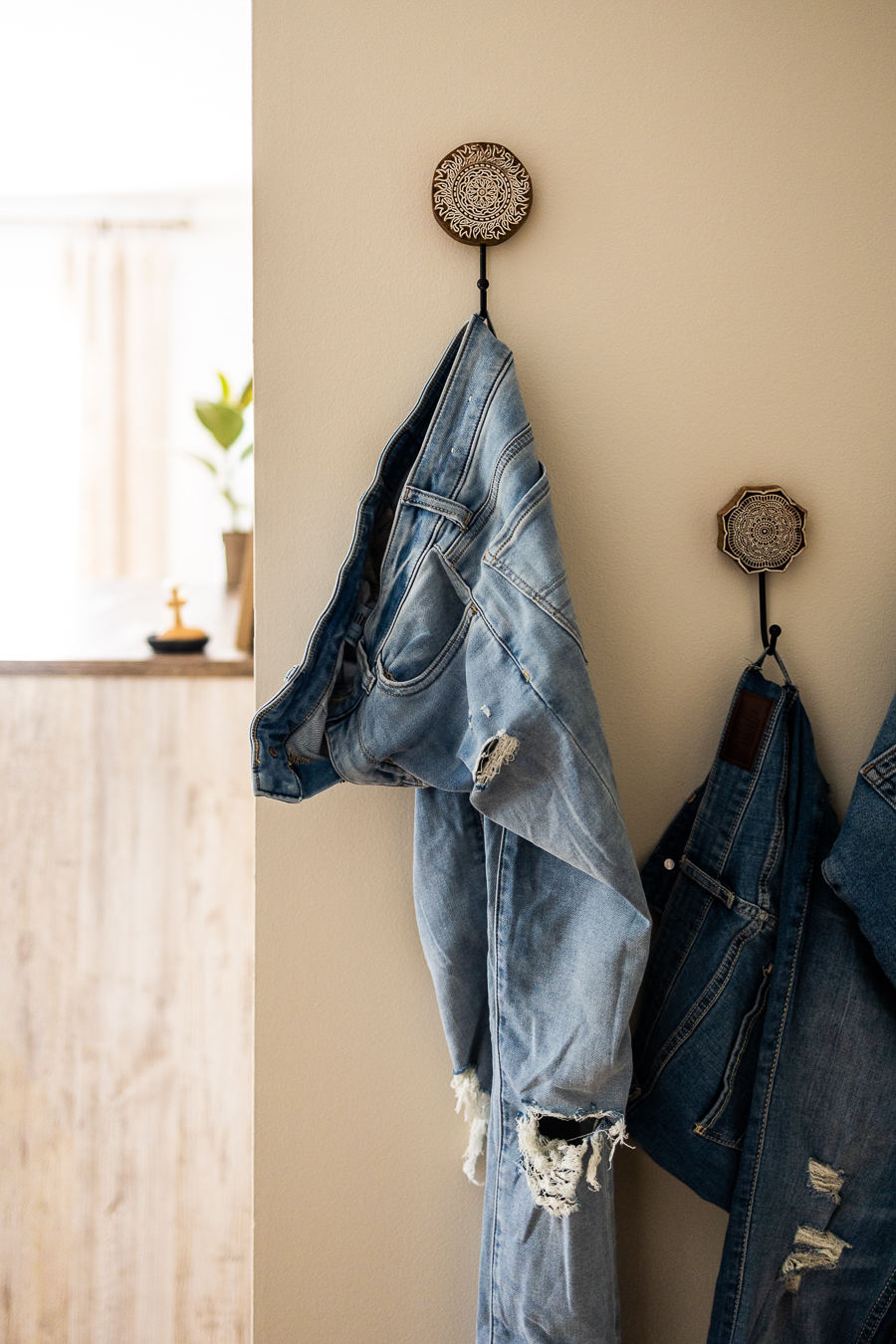 13. Put Decorative Hooks Where Clothes Tend to Land