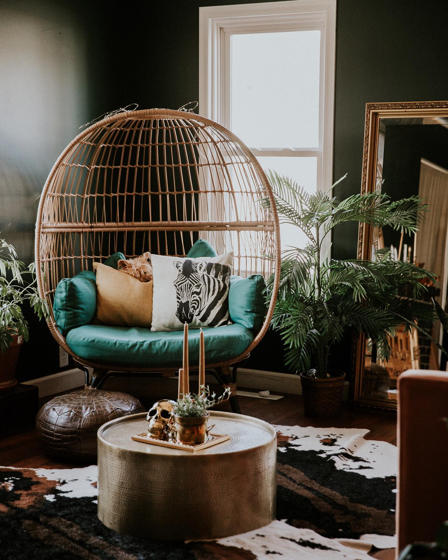 3. Give a Woven Chair a Dark Green Backdrop