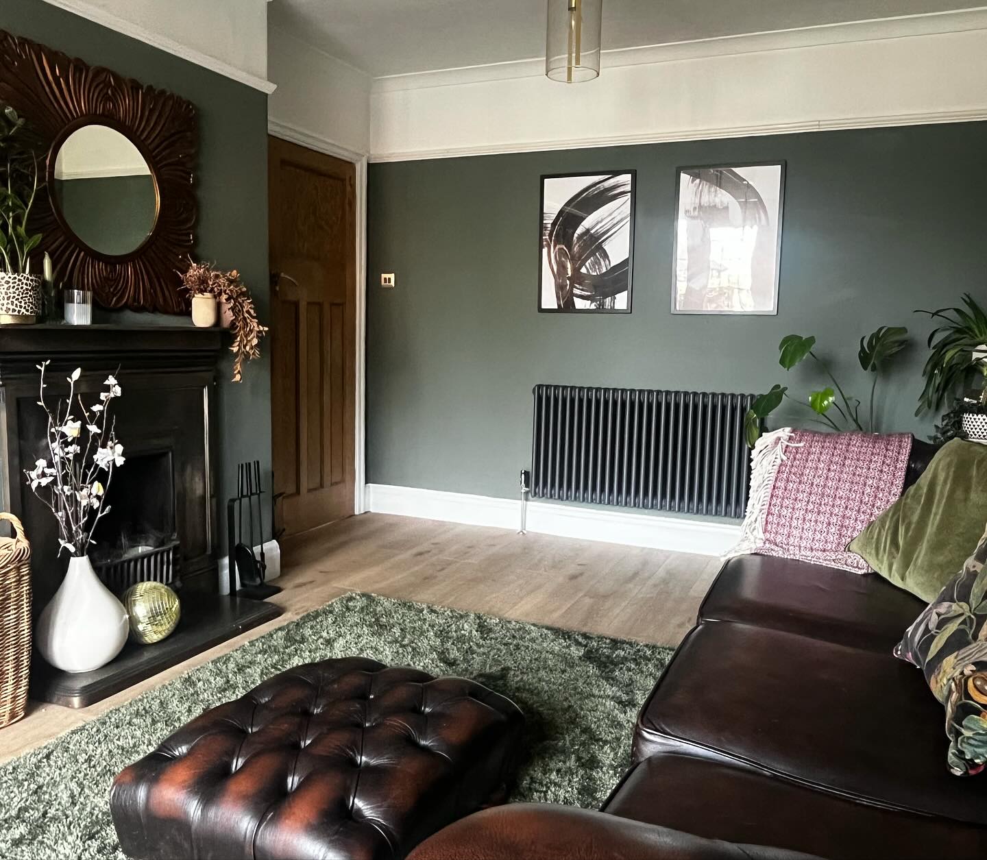 6. Pair Deep Brown Leather With Muted Green Walls
